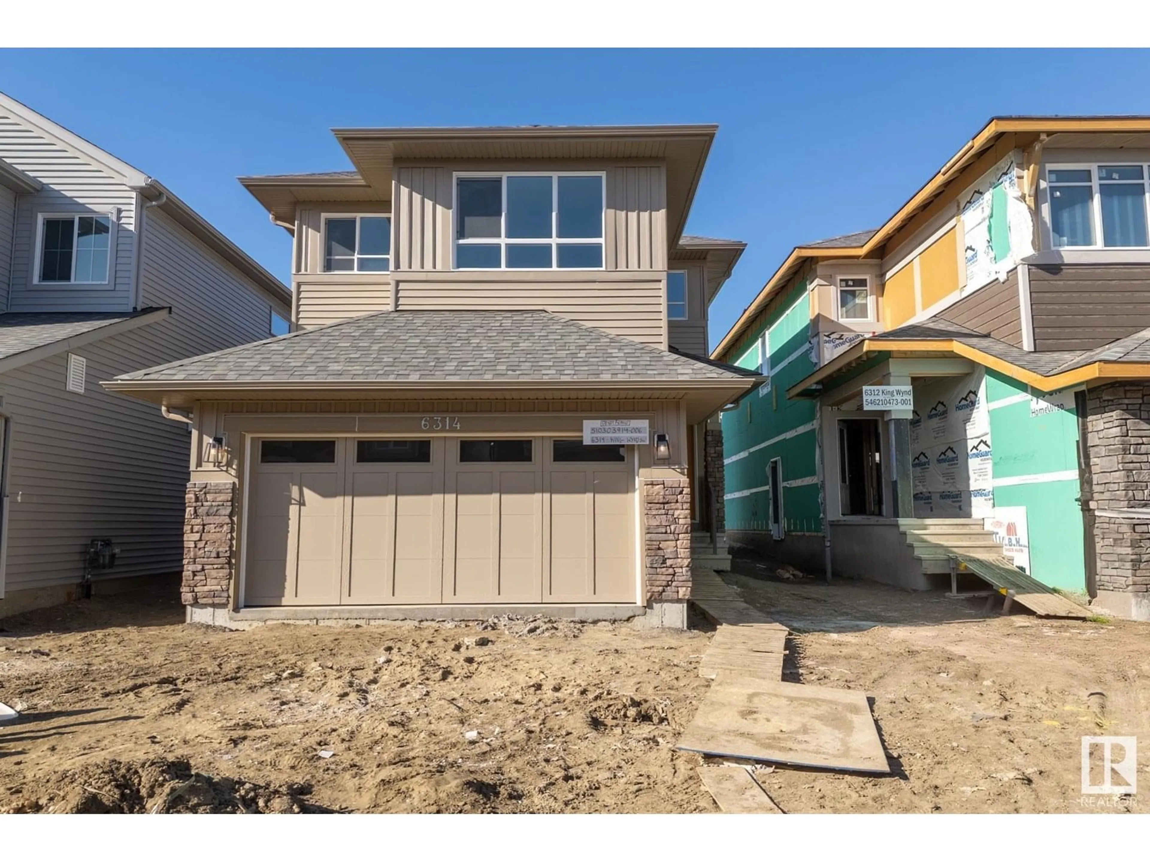 Home with vinyl exterior material, street for 6314 KING WD, Edmonton Alberta T6W5G4