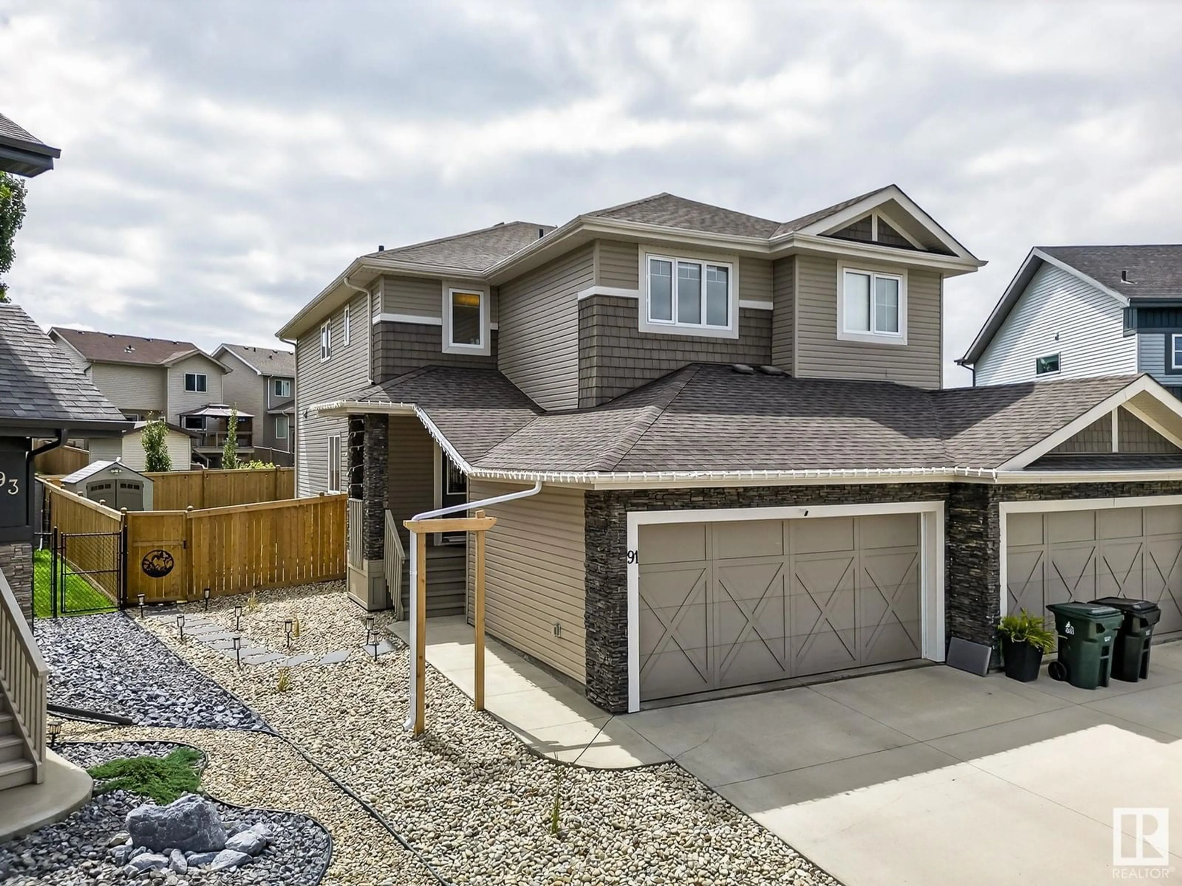 Home with vinyl exterior material, street for 91 SPRUCE GARDENS CR, Spruce Grove Alberta T7X0J9