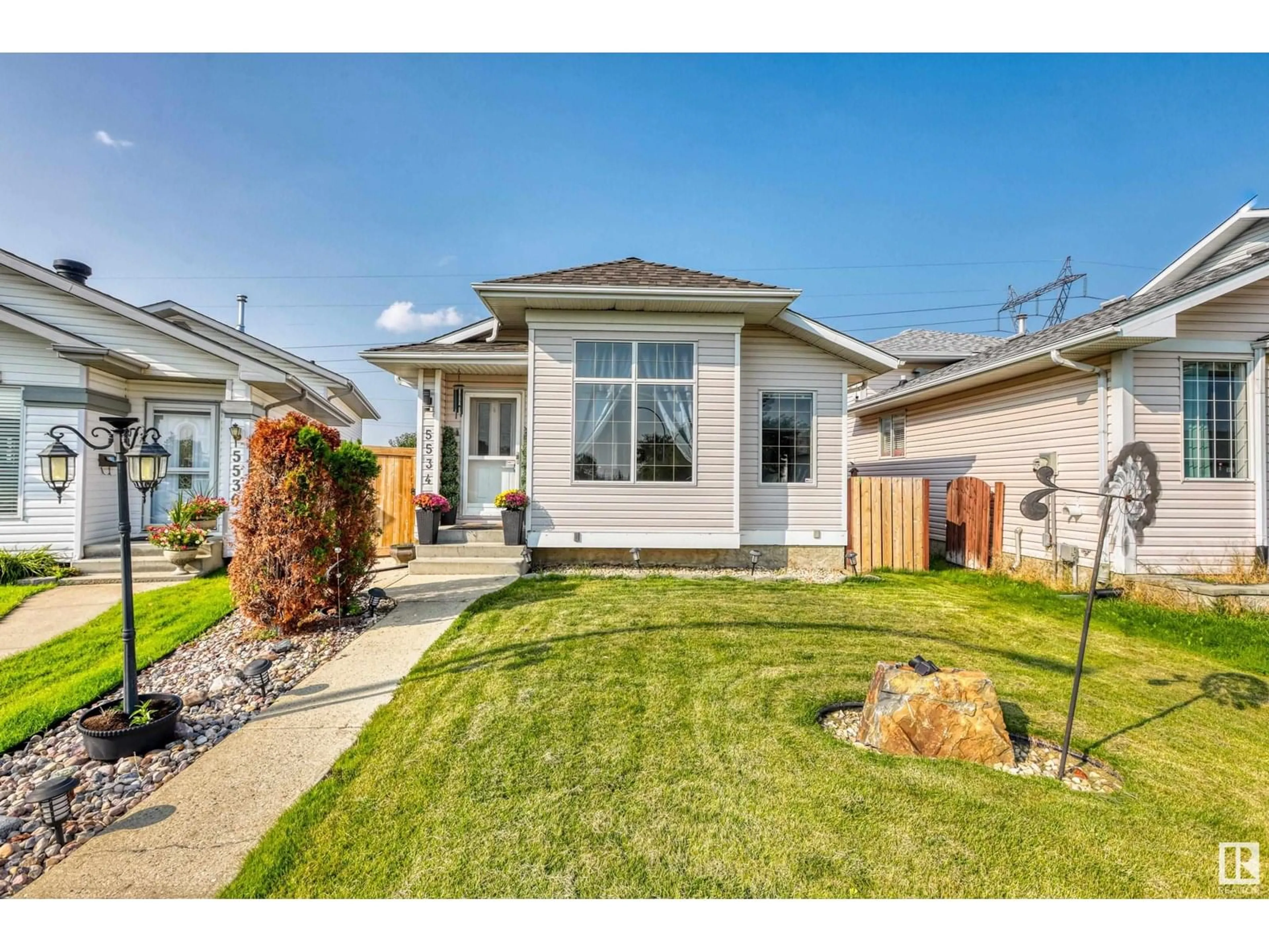 Home with vinyl exterior material, street for 5534 162A AV, Edmonton Alberta T5Y2T8