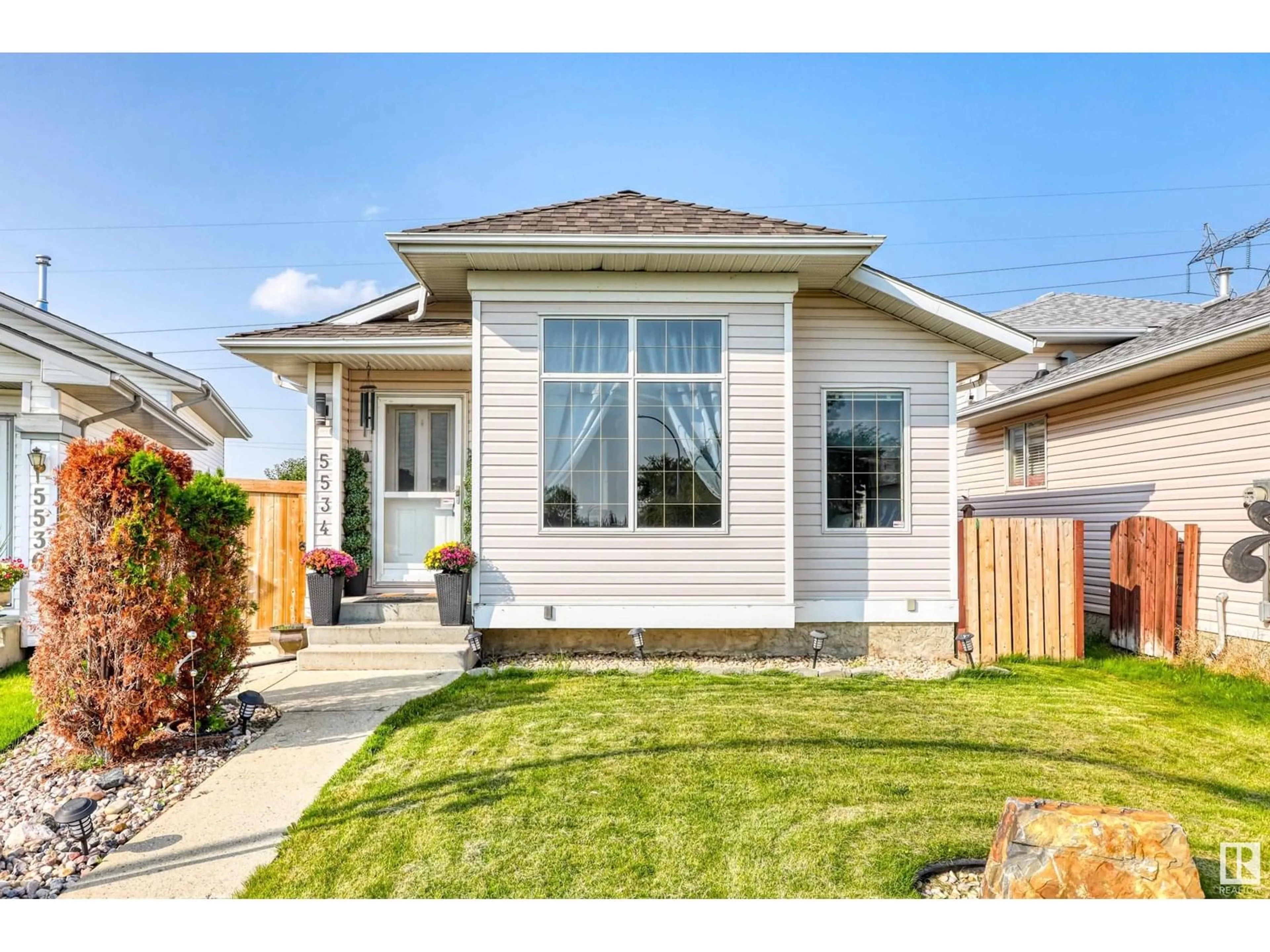 Home with vinyl exterior material, street for 5534 162A AV, Edmonton Alberta T5Y2T8