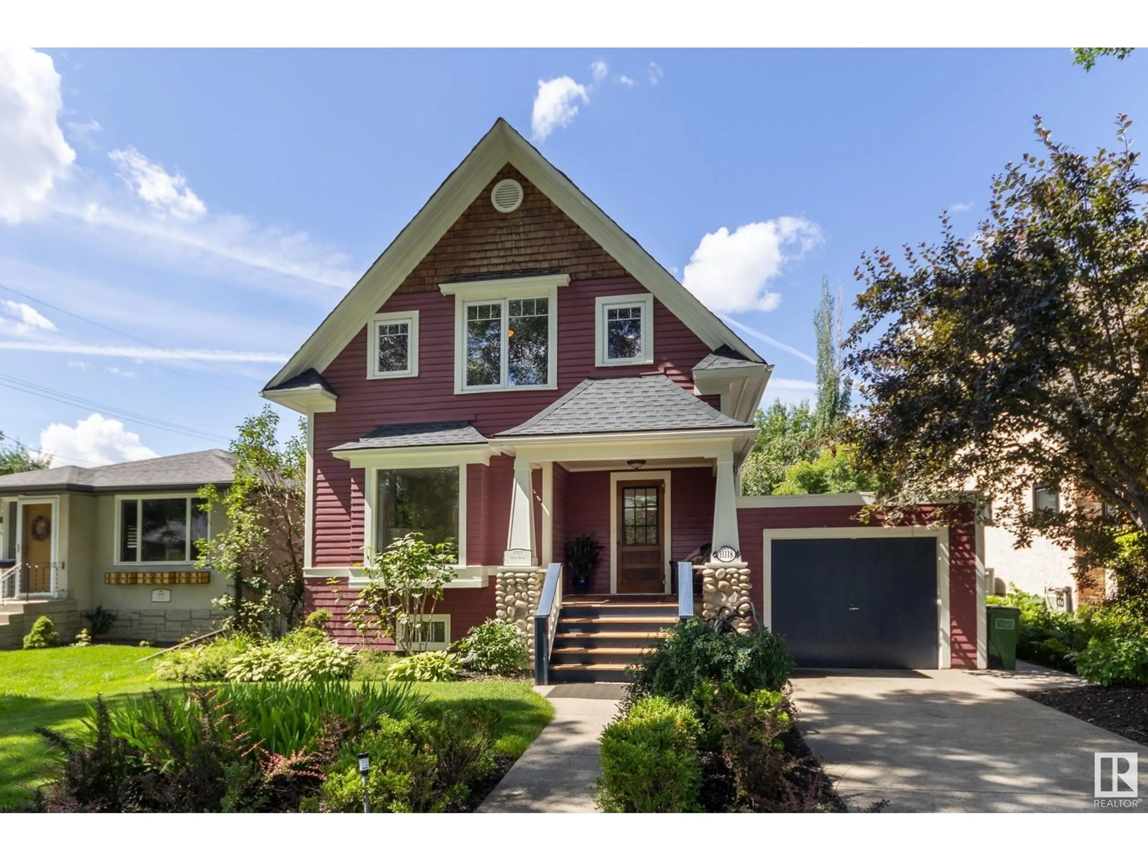 Home with brick exterior material, street for NW - 11118 65 ST, Edmonton Alberta T5W4K1