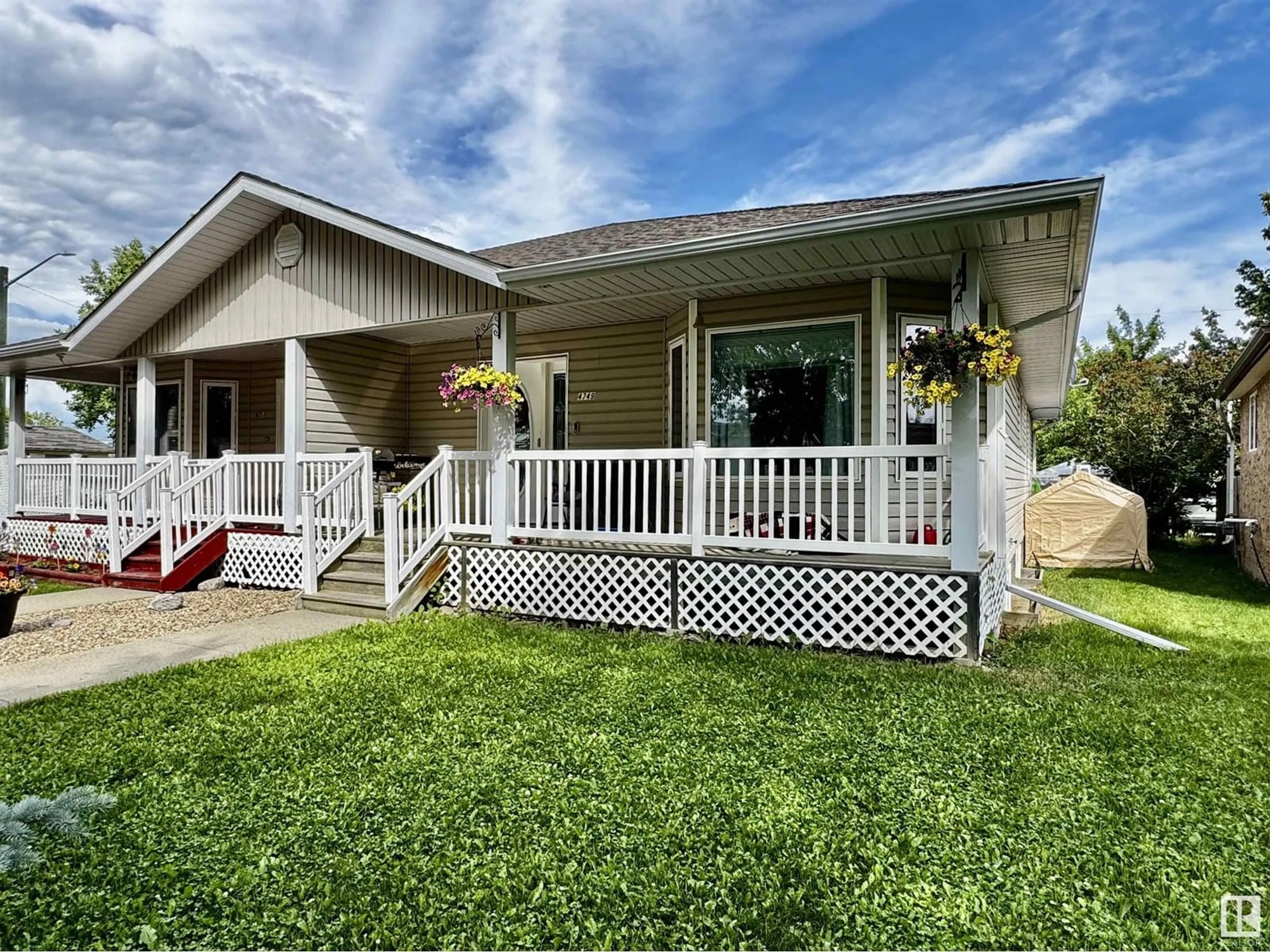Home with vinyl exterior material, street for 4749 47A AV, Drayton Valley Alberta T7A0A8