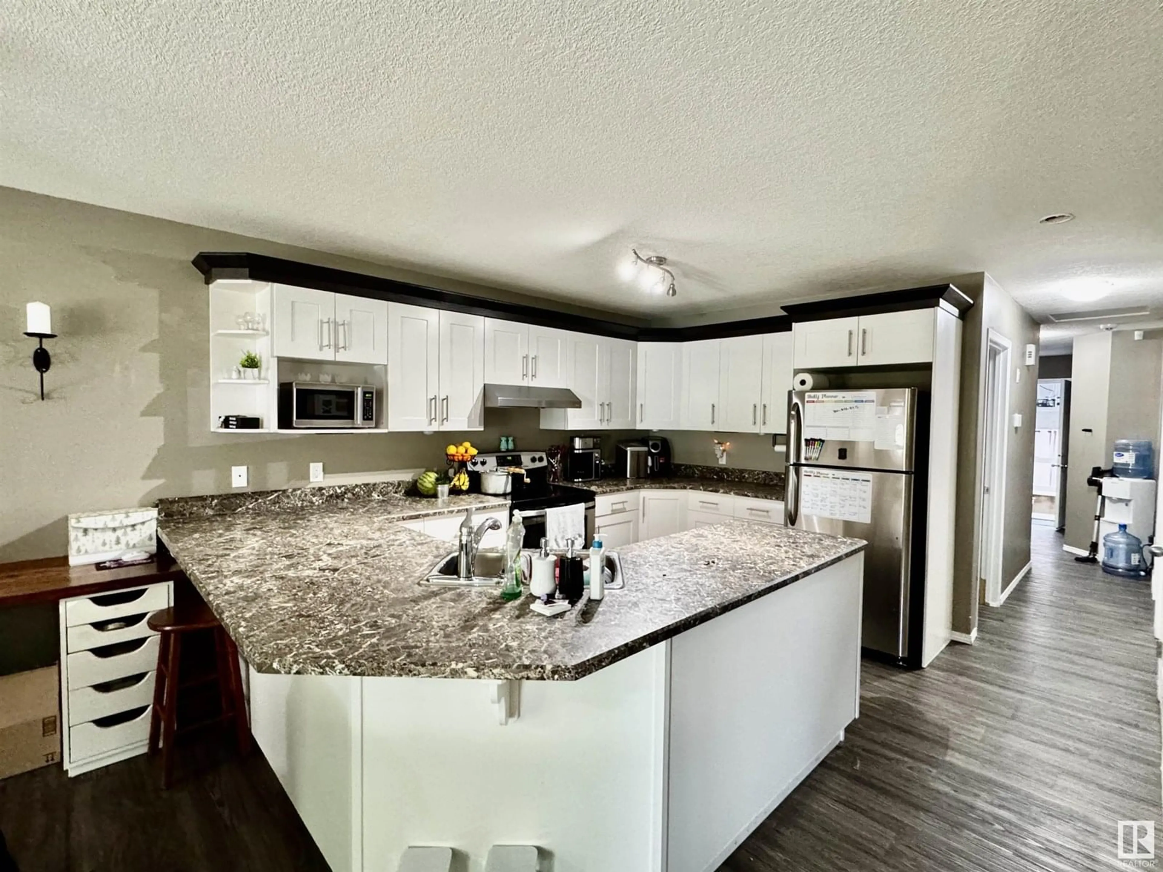 Open concept kitchen, ceramic/tile floor for 4749 47A AV, Drayton Valley Alberta T7A0A8