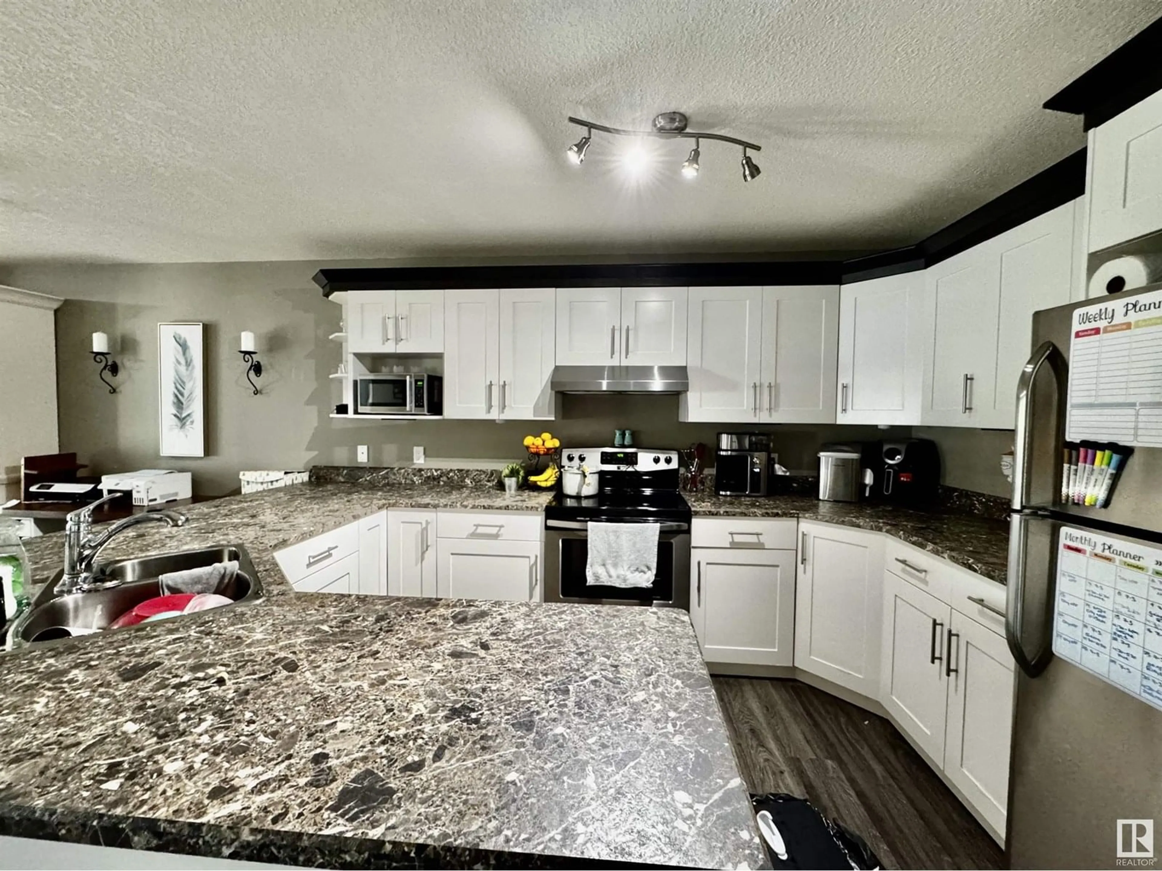 Open concept kitchen, ceramic/tile floor for 4749 47A AV, Drayton Valley Alberta T7A0A8