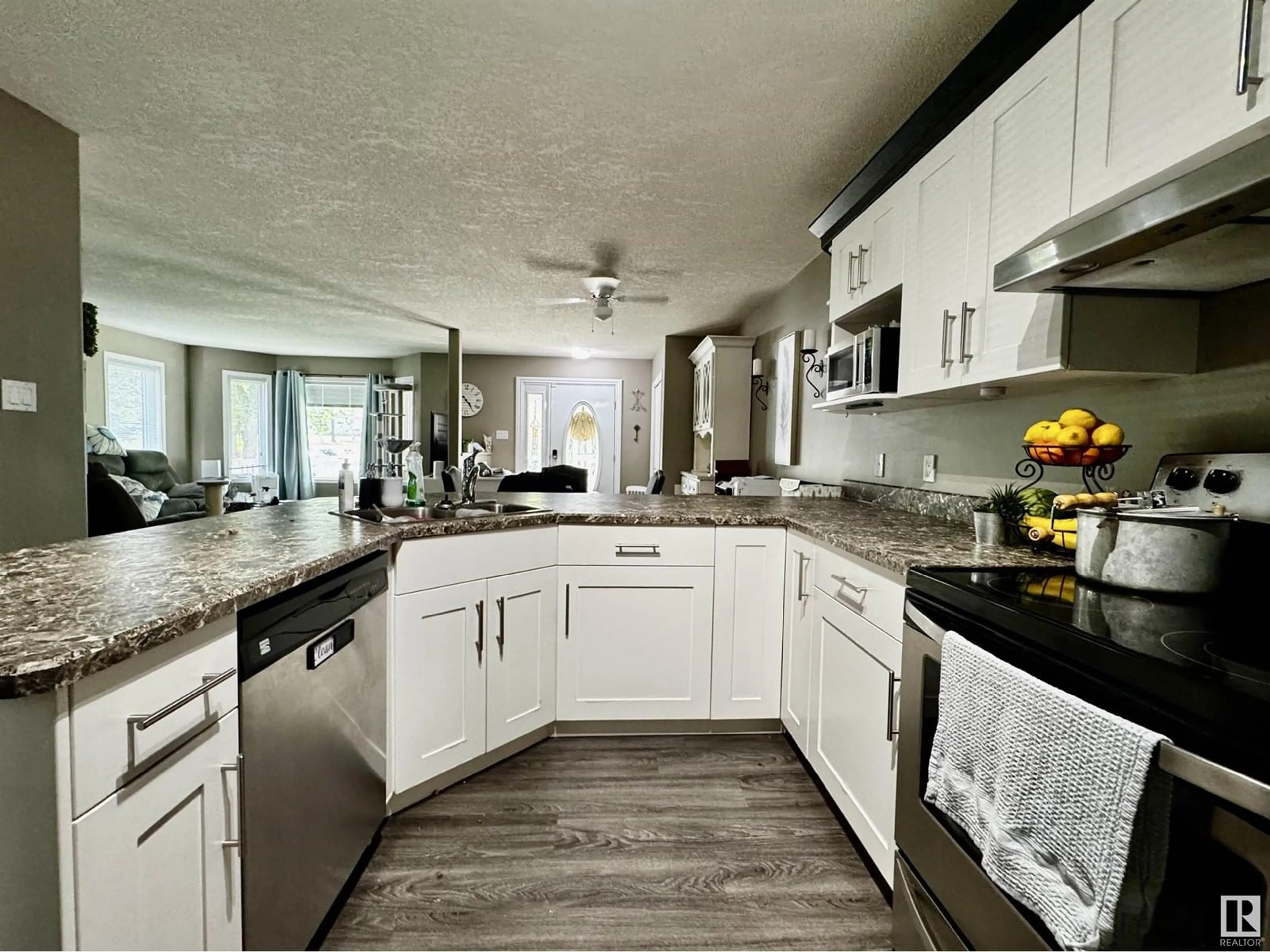 Open concept kitchen, ceramic/tile floor for 4749 47A AV, Drayton Valley Alberta T7A0A8