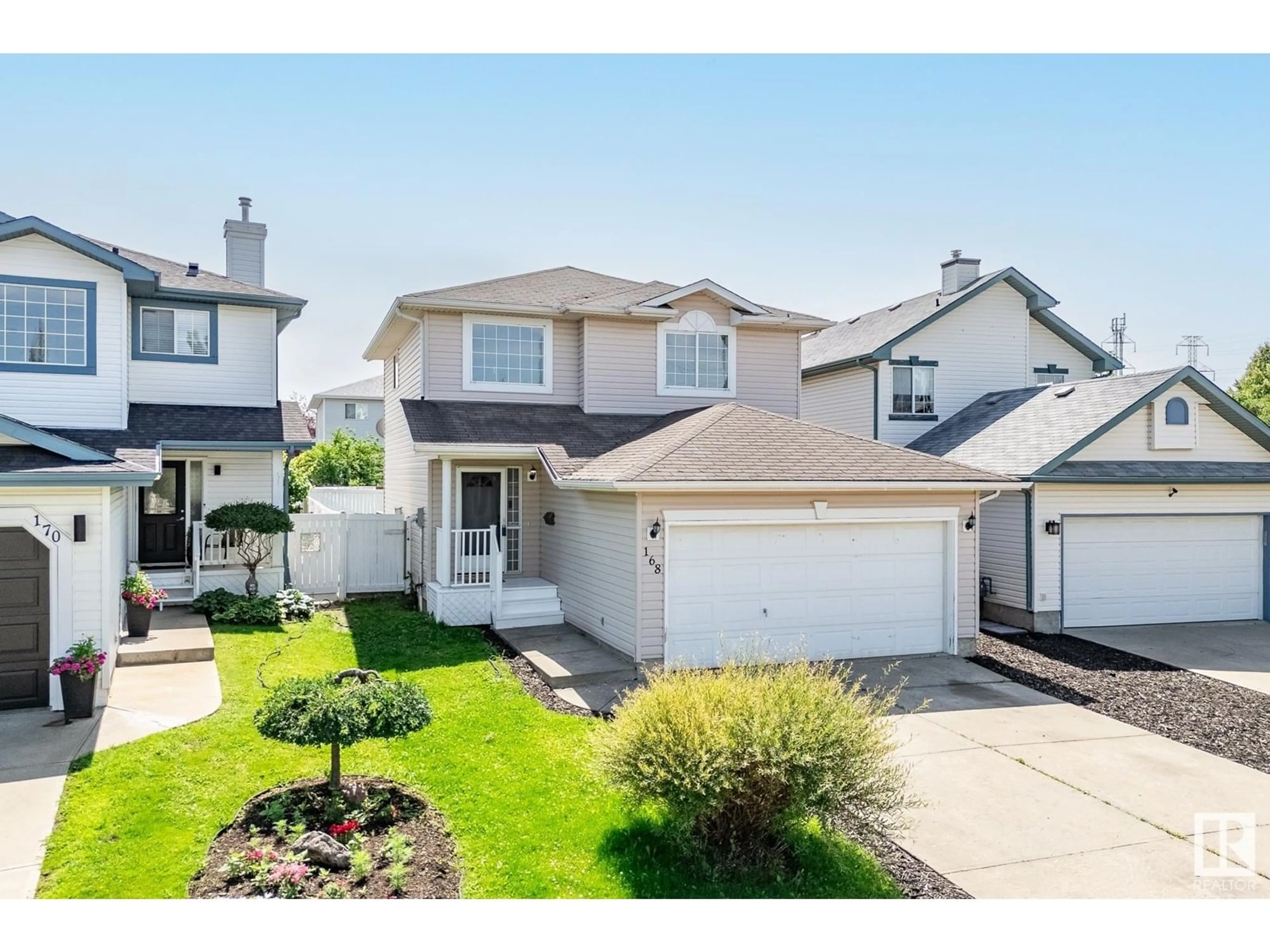 Home with vinyl exterior material, street for 168 WARD CR, Edmonton Alberta T6T1M6