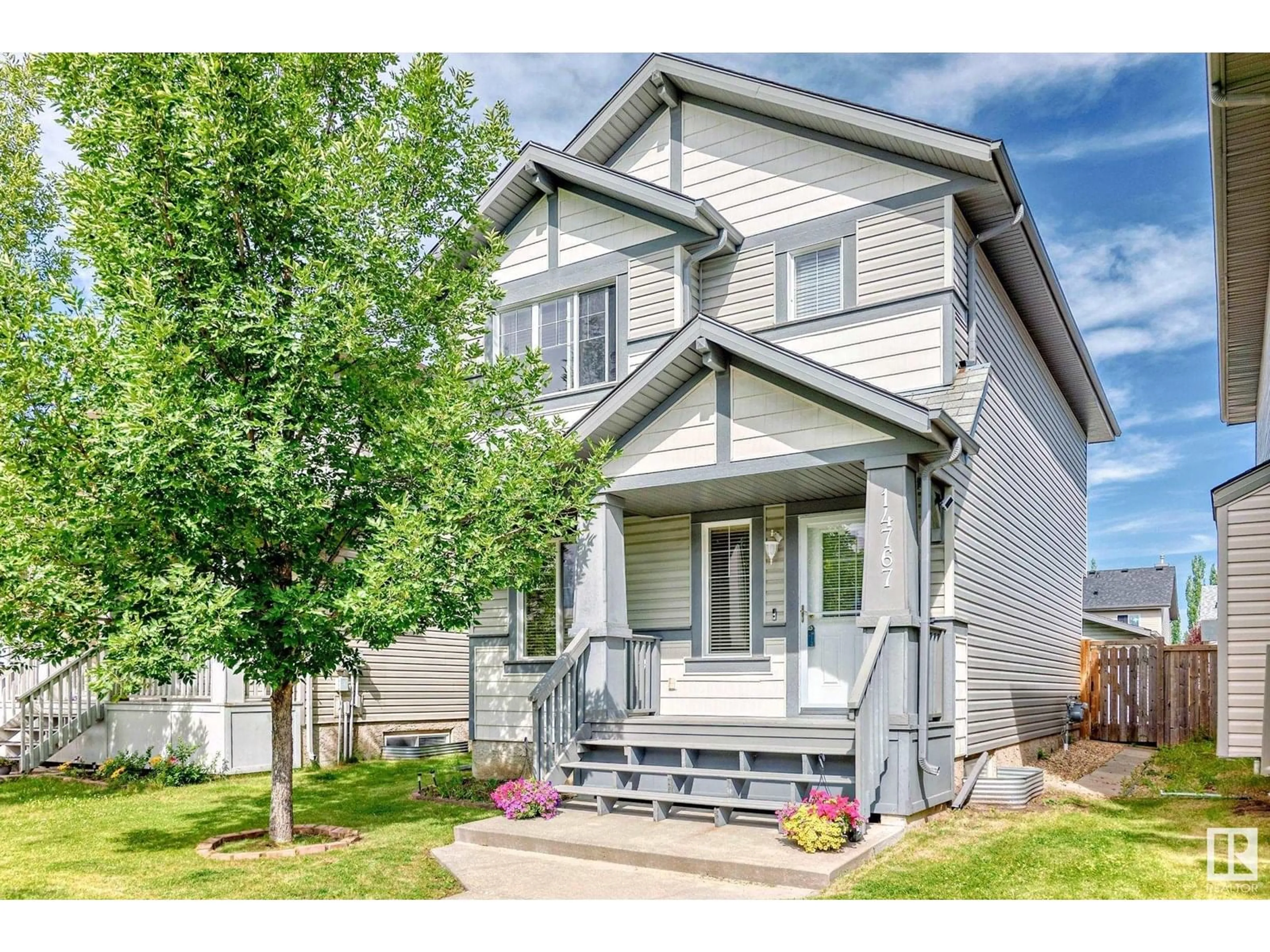 Home with vinyl exterior material, street for NW - 14767 140 ST, Edmonton Alberta T6V0A4