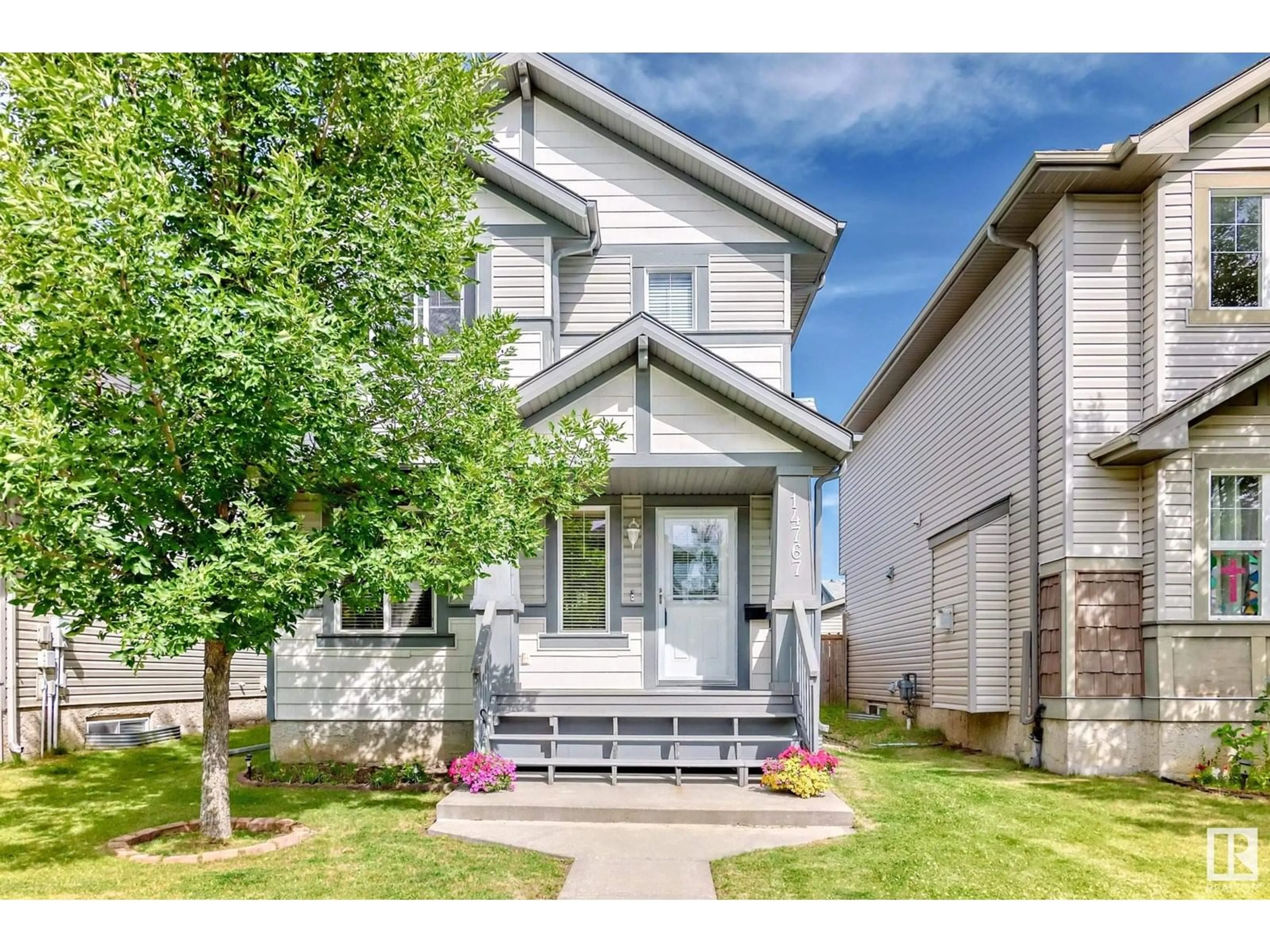 Home with vinyl exterior material, street for NW - 14767 140 ST, Edmonton Alberta T6V0A4
