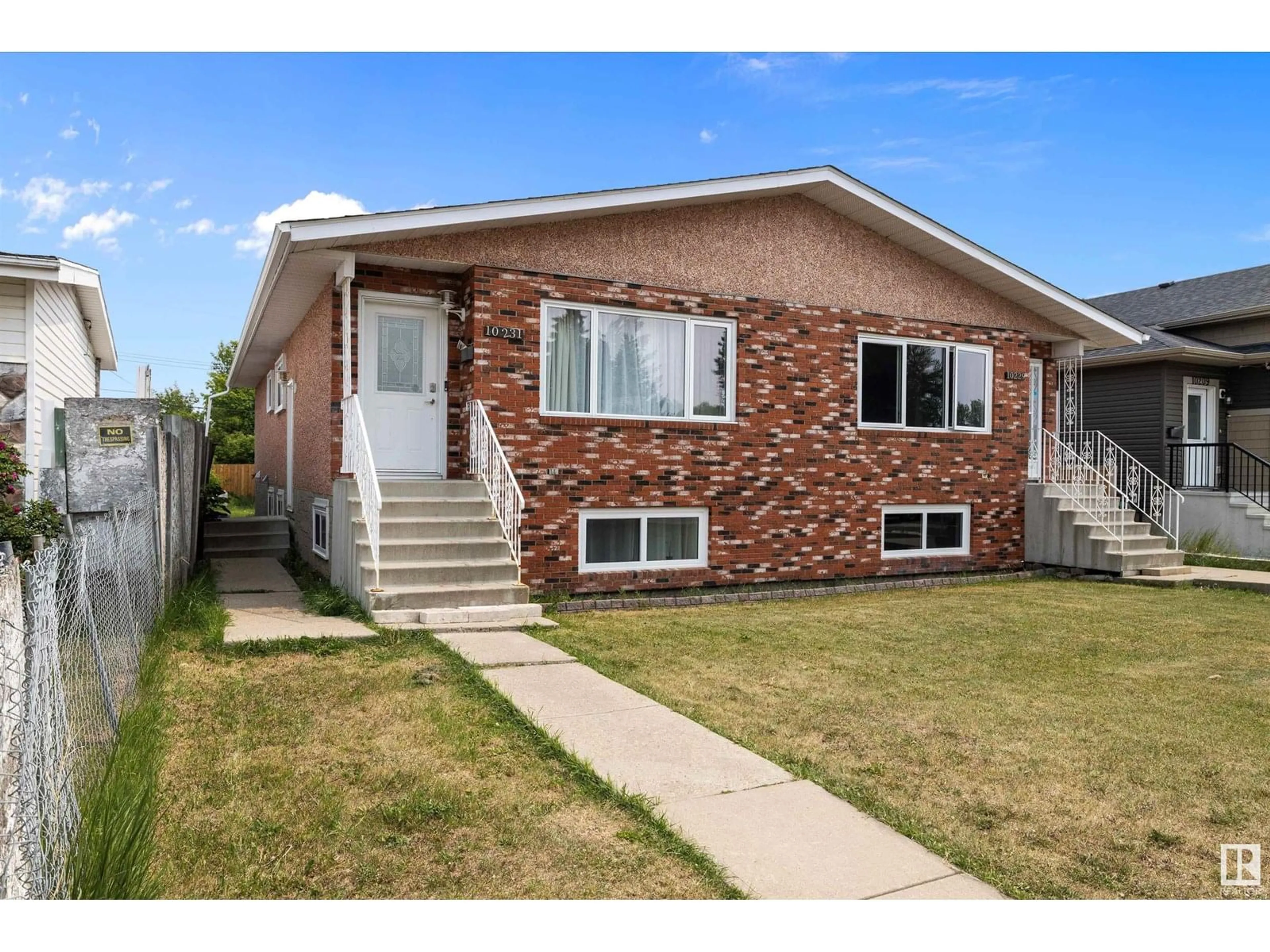 Home with vinyl exterior material, street for NW - 10229/10231 159 ST, Edmonton Alberta T5P3A3