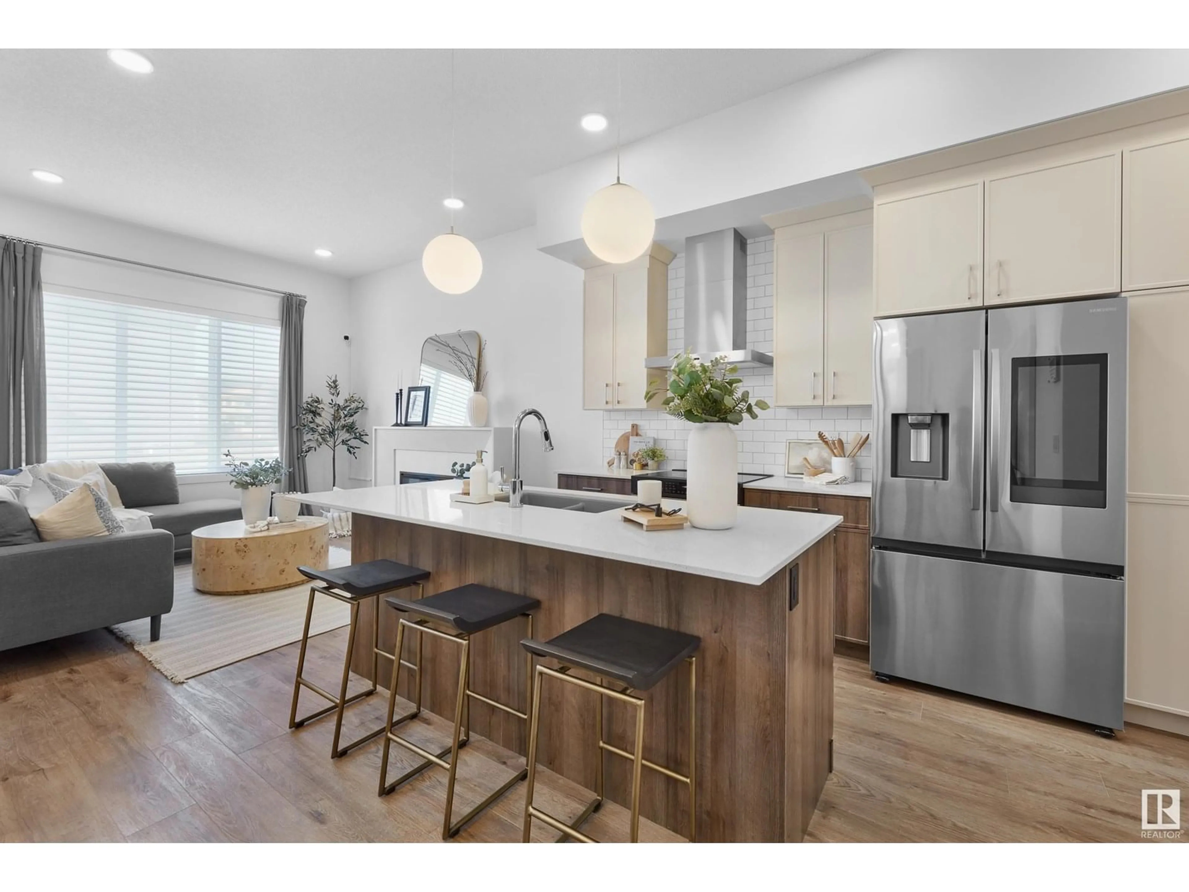 Open concept kitchen, wood/laminate floor for 3 DEER MEADOW CR, Fort Saskatchewan Alberta T8L0X9