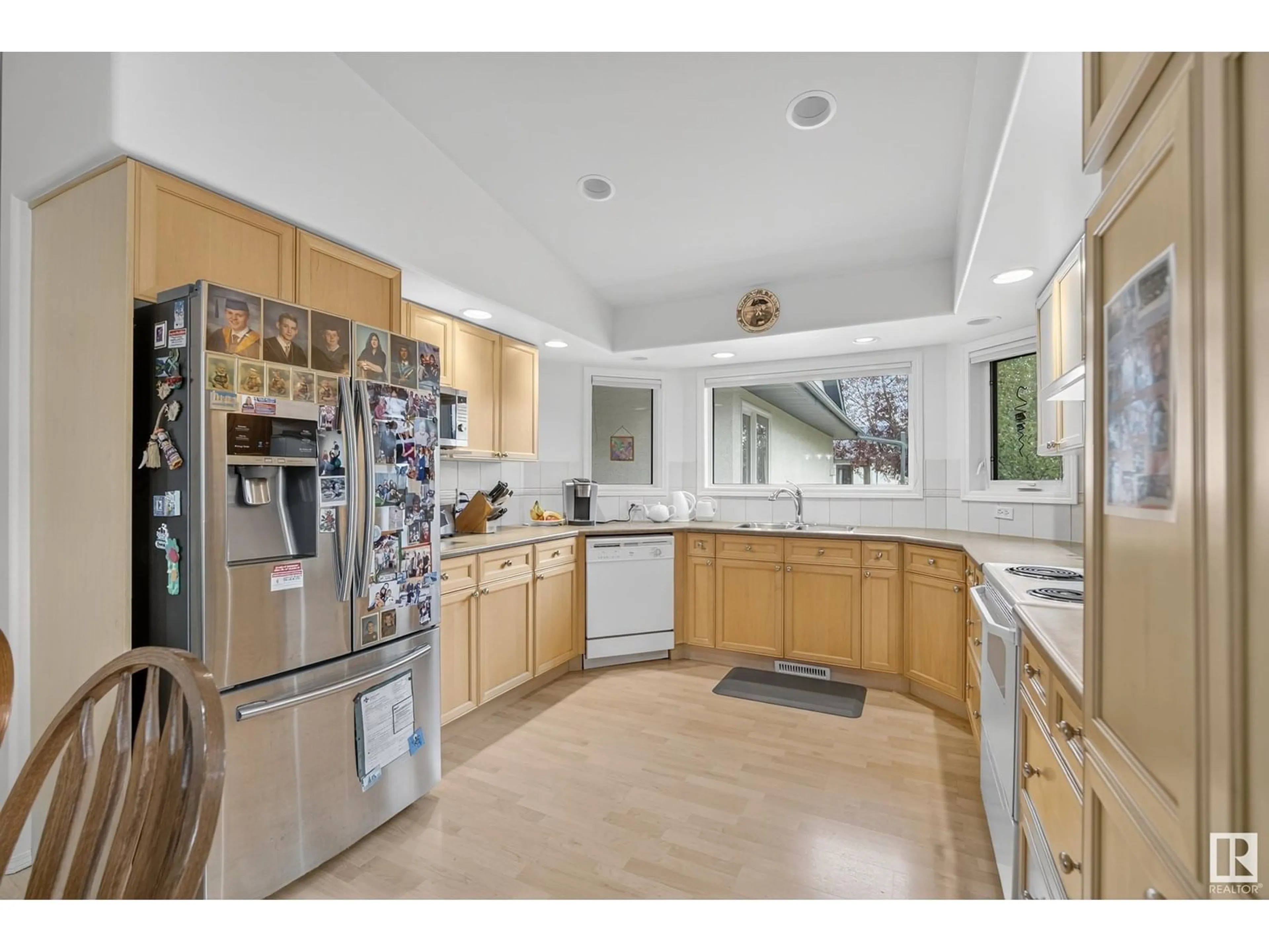 Open concept kitchen, ceramic/tile floor for 8 - 32 DECHENE RD, Edmonton Alberta T6M2S5
