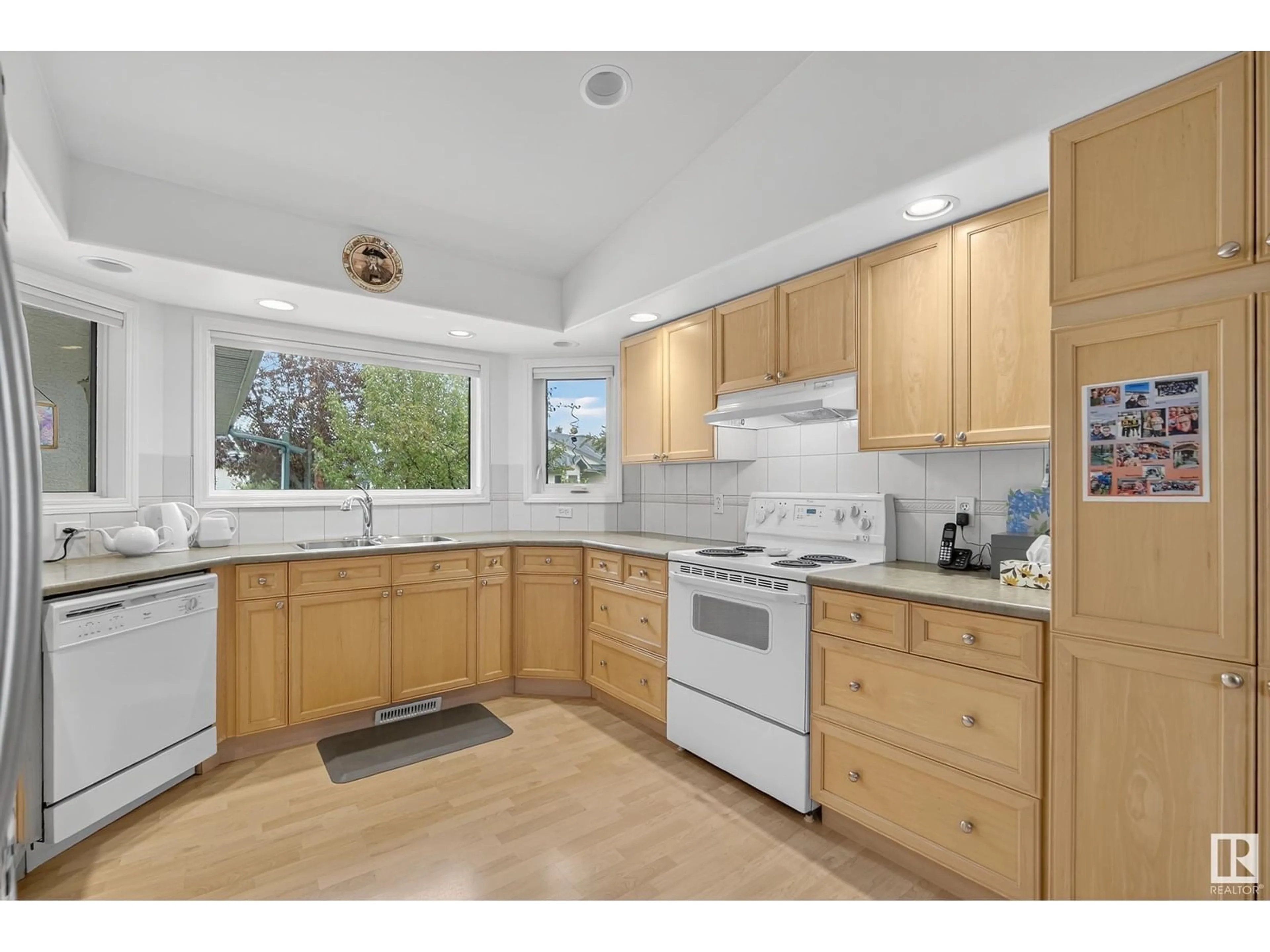 Standard kitchen, wood/laminate floor for 8 - 32 DECHENE RD, Edmonton Alberta T6M2S5