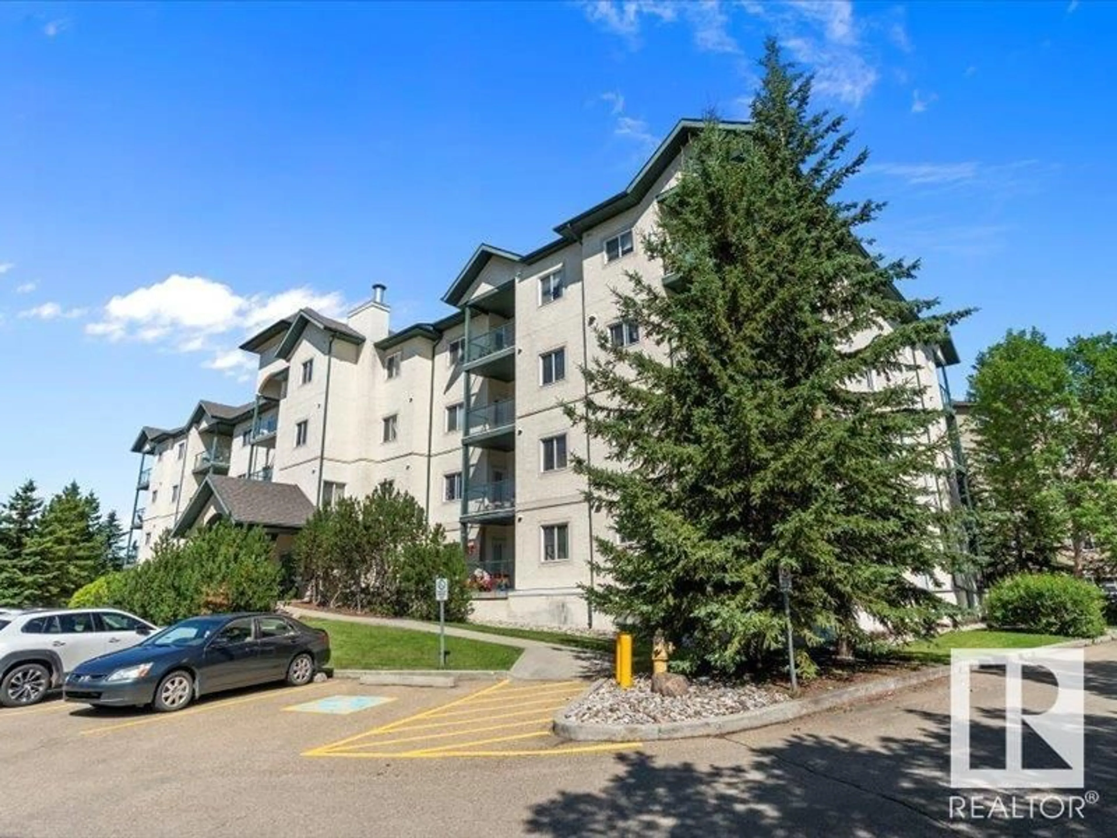 A pic from outside/outdoor area/front of a property/back of a property/a pic from drone, mountain view for 408 - 304 LEWIS ESTATES BV, Edmonton Alberta T5T6Y7