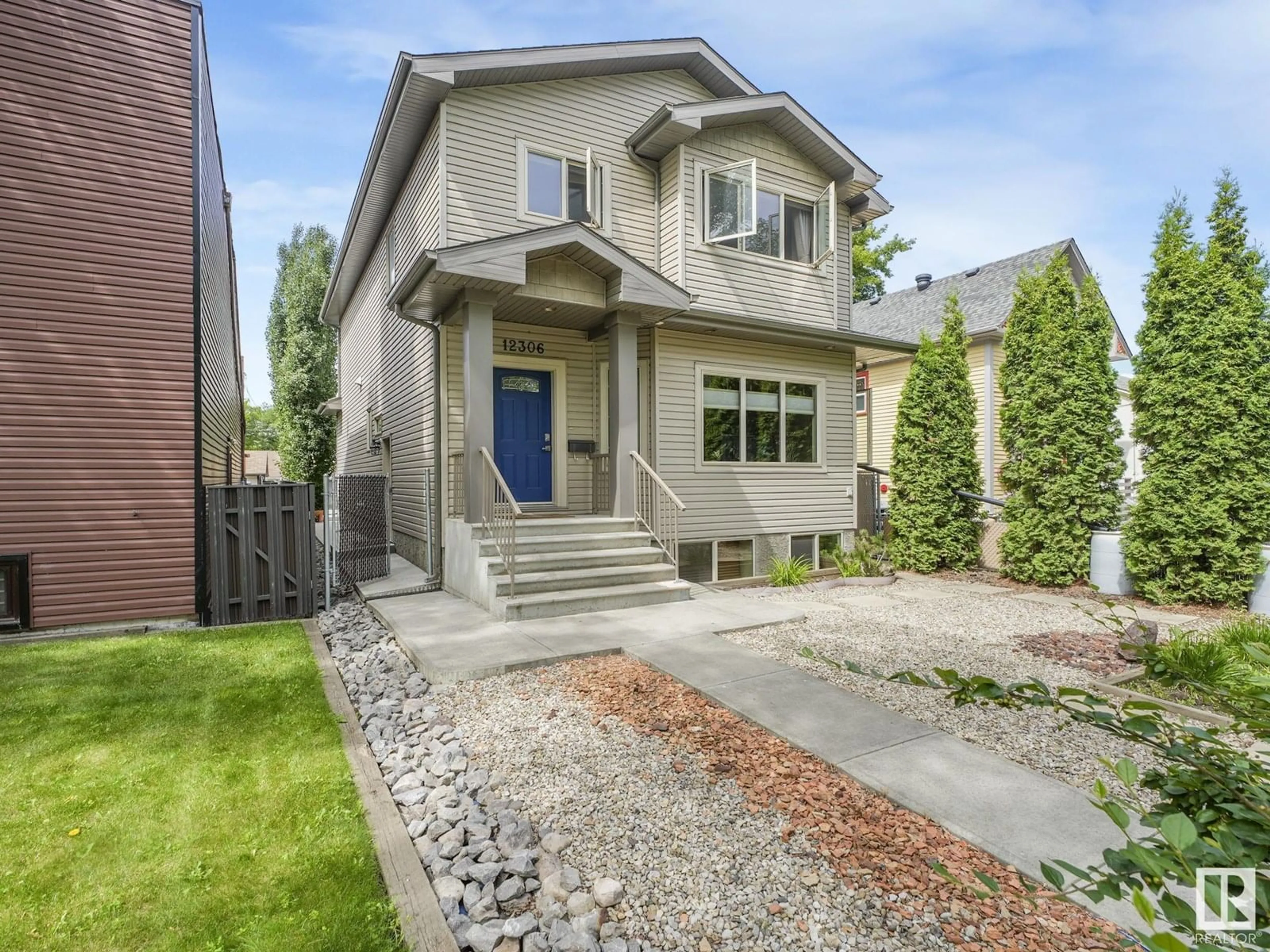Home with brick exterior material, street for NW - 12306 101 ST, Edmonton Alberta T5G2C7