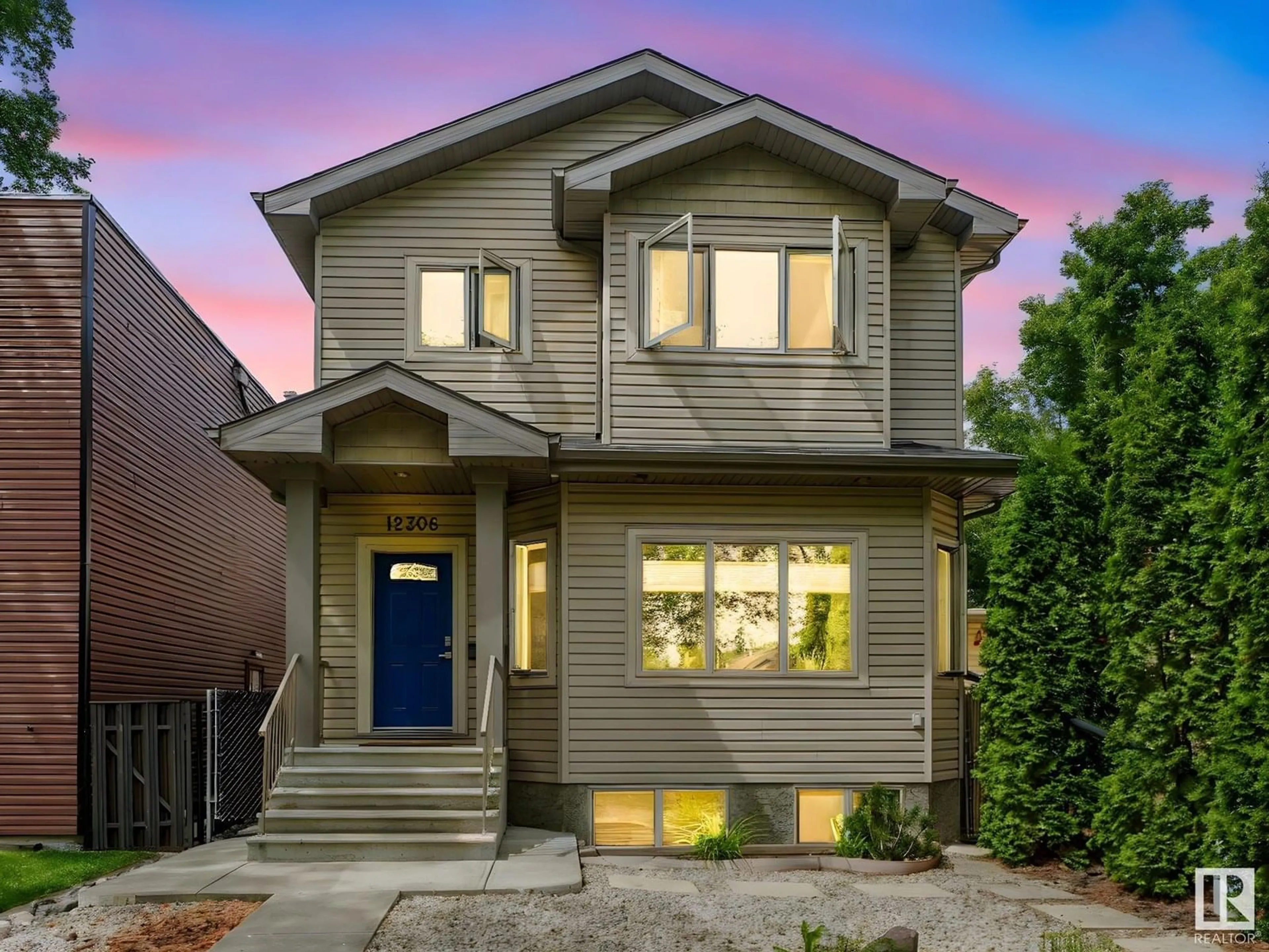 Home with brick exterior material, street for NW - 12306 101 ST, Edmonton Alberta T5G2C7