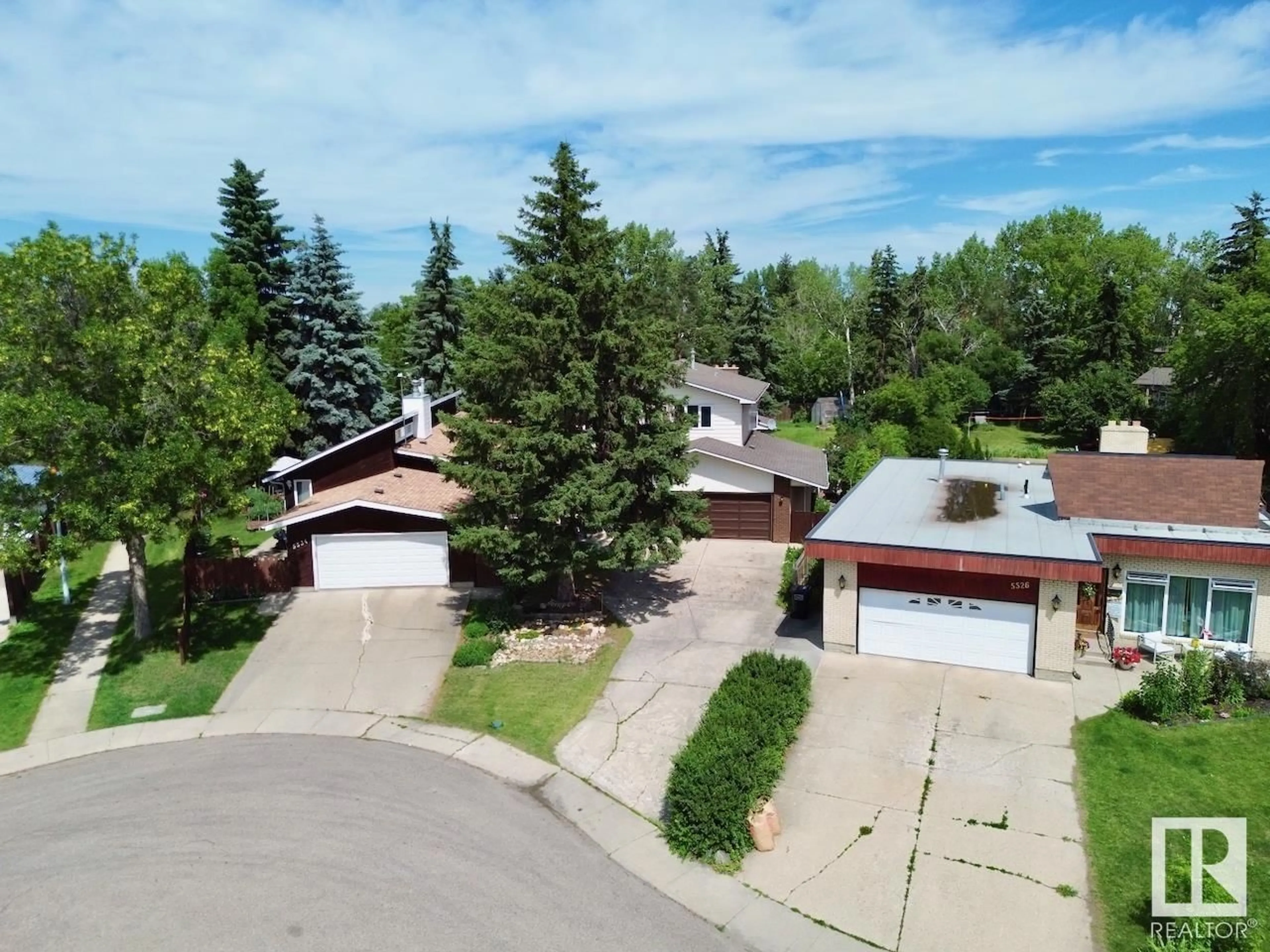 A pic from outside/outdoor area/front of a property/back of a property/a pic from drone, street for 5530 145A AV, Edmonton Alberta T5A2S1