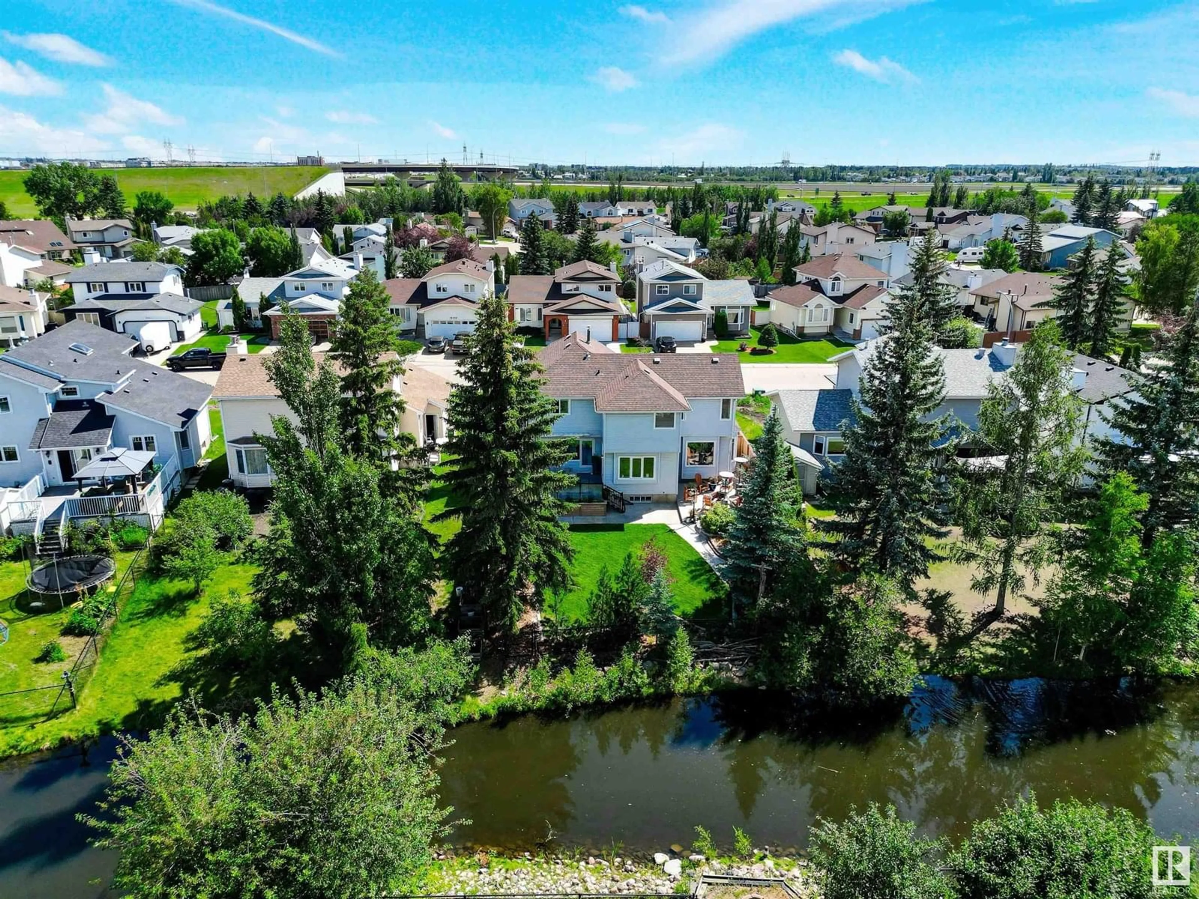 A pic from outside/outdoor area/front of a property/back of a property/a pic from drone, water/lake/river/ocean view for 10434 10A AV, Edmonton Alberta T6J6G4