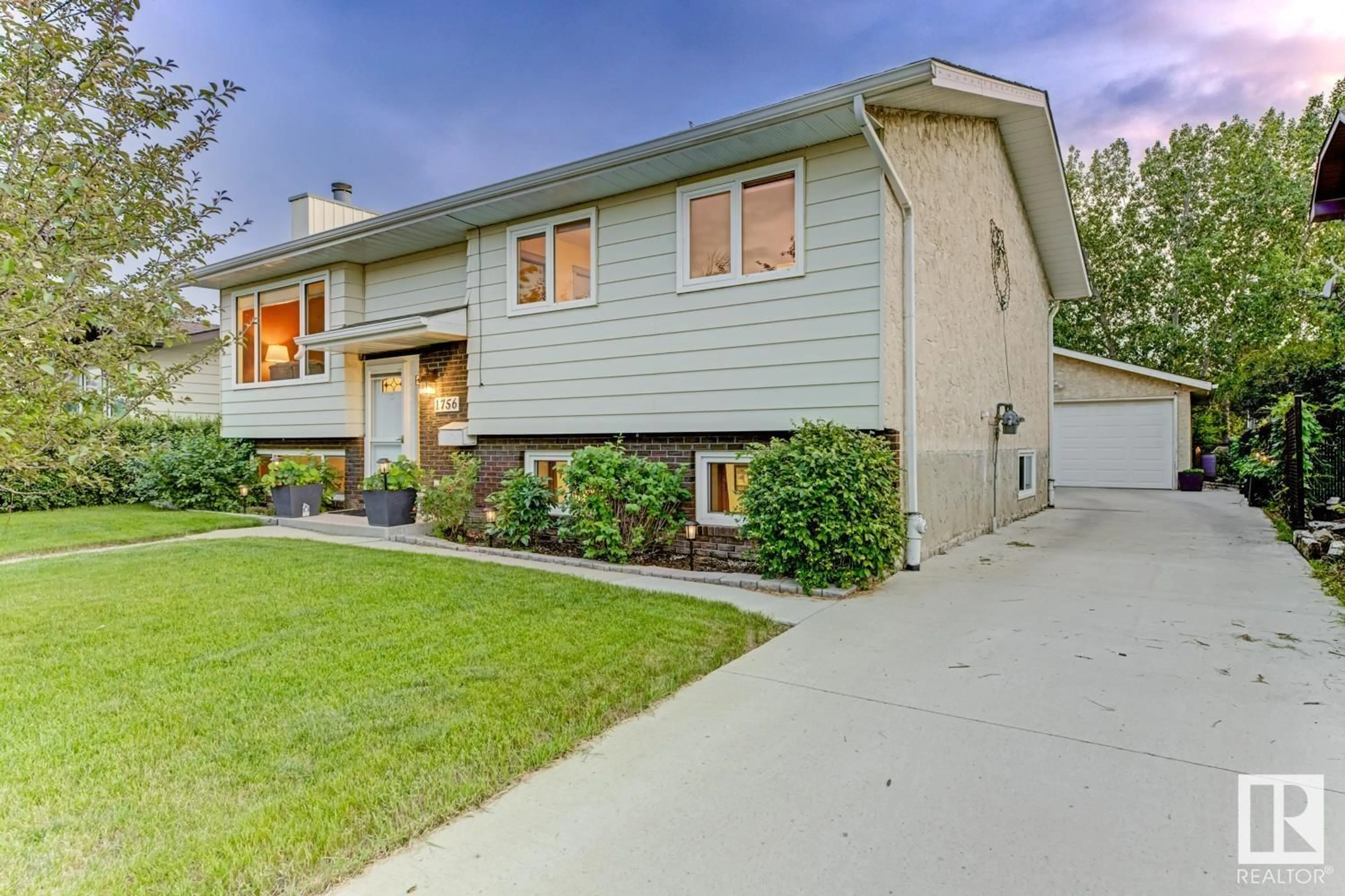 Home with vinyl exterior material, street for 1756 49A ST, Edmonton Alberta T6L3K6