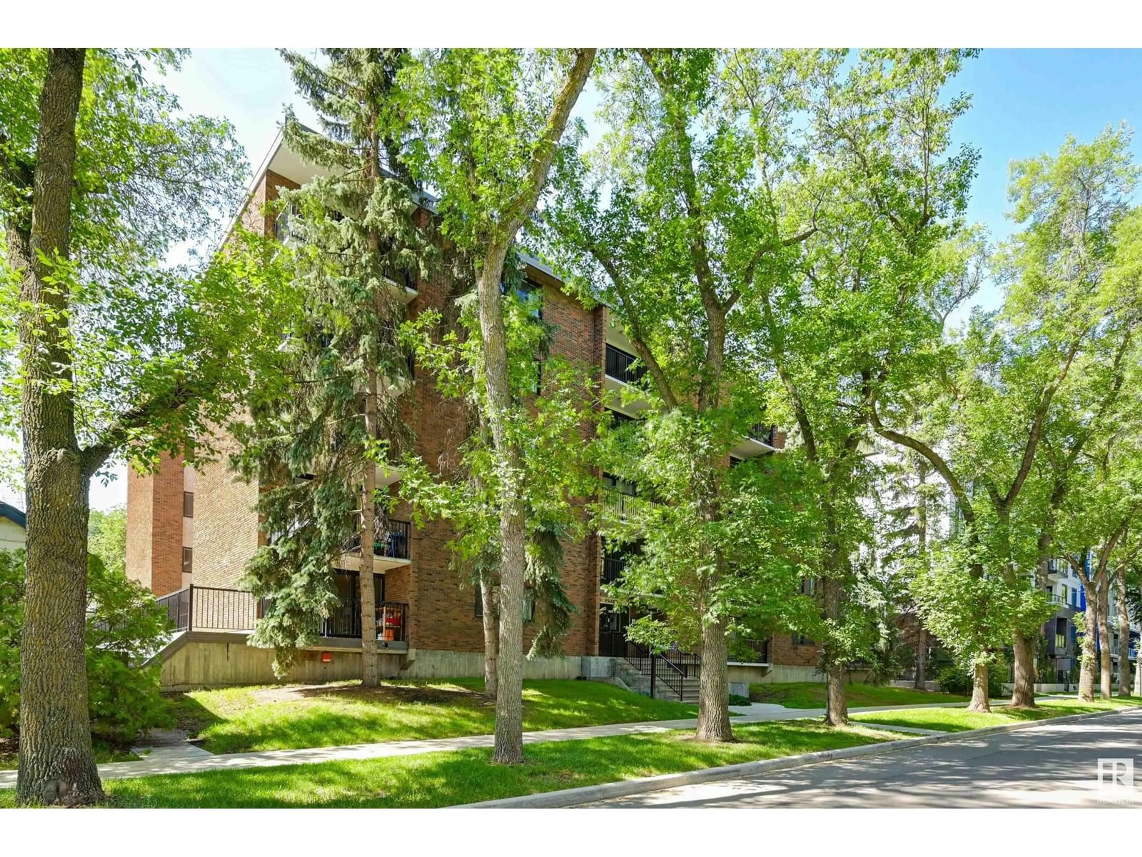 Home with brick exterior material, street for 407 - 11011 86 AV, Edmonton Alberta T6G0X1
