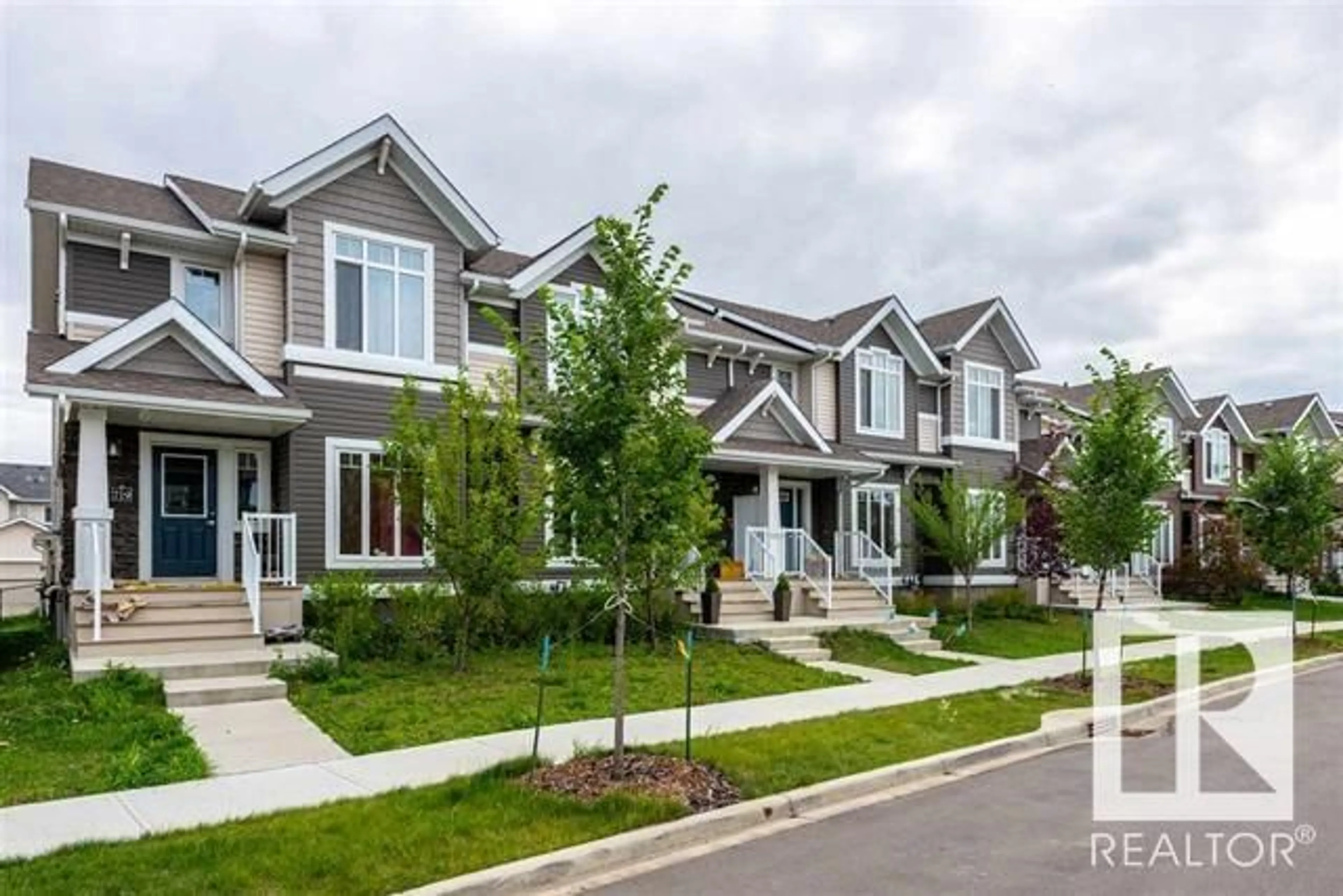 Home with vinyl exterior material, street for SW - 721 177 ST, Edmonton Alberta T6W2L7