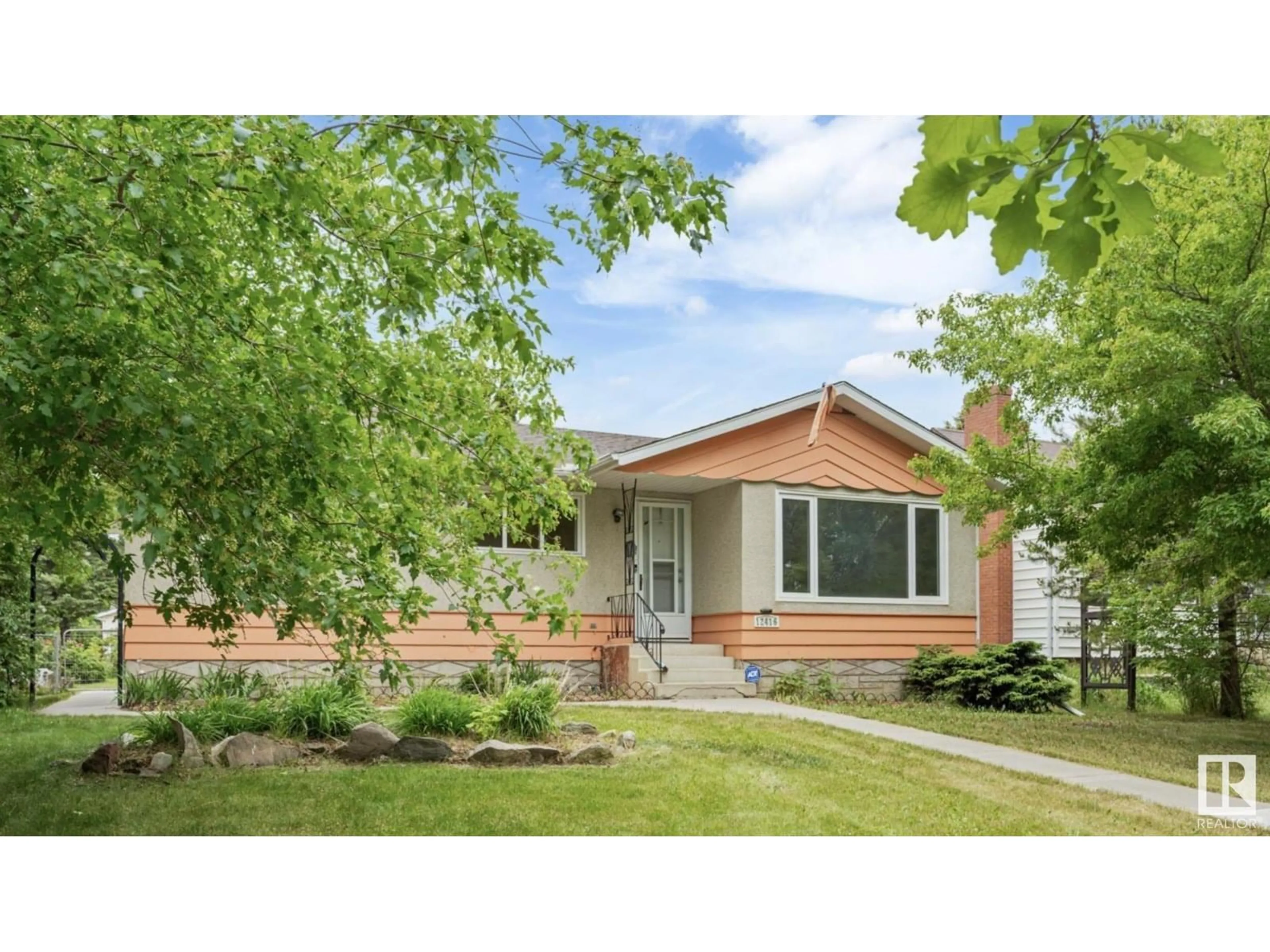 Home with vinyl exterior material, street for 12416 77 STREET, Edmonton Alberta T5B2H5