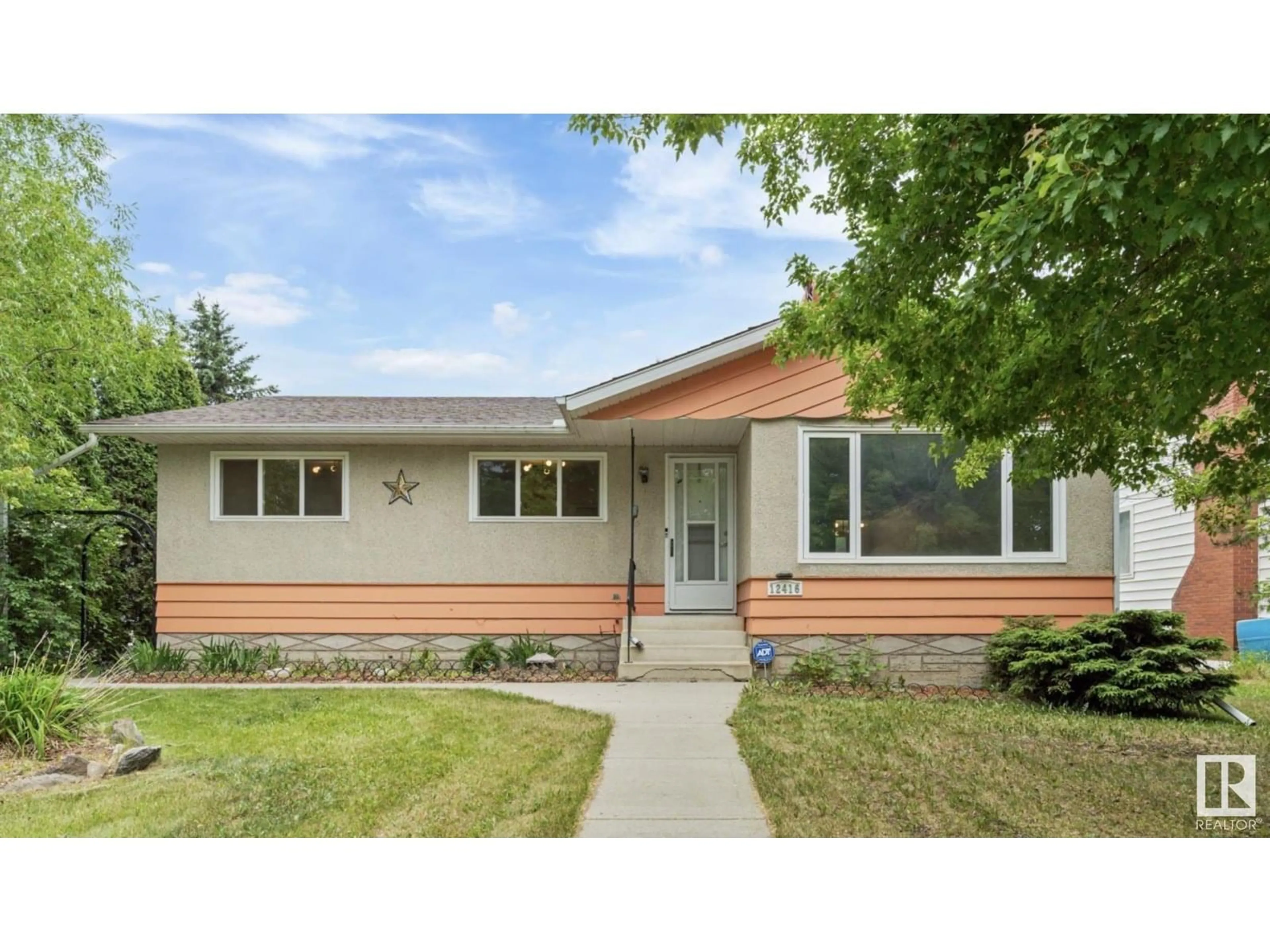 Home with vinyl exterior material, street for 12416 77 STREET, Edmonton Alberta T5B2H5