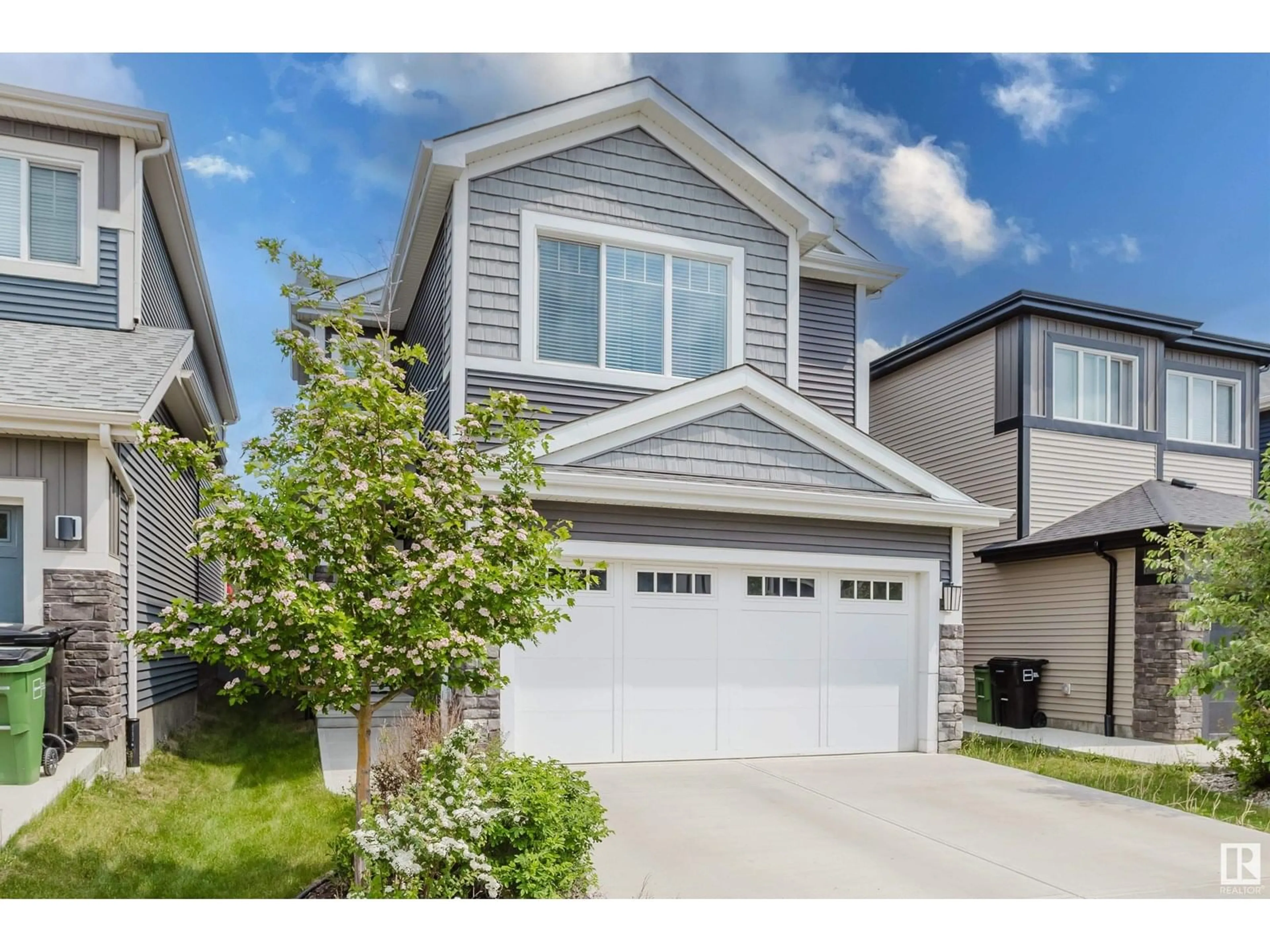 Home with vinyl exterior material, street for 8147 226 ST NW, Edmonton Alberta T5T7K9