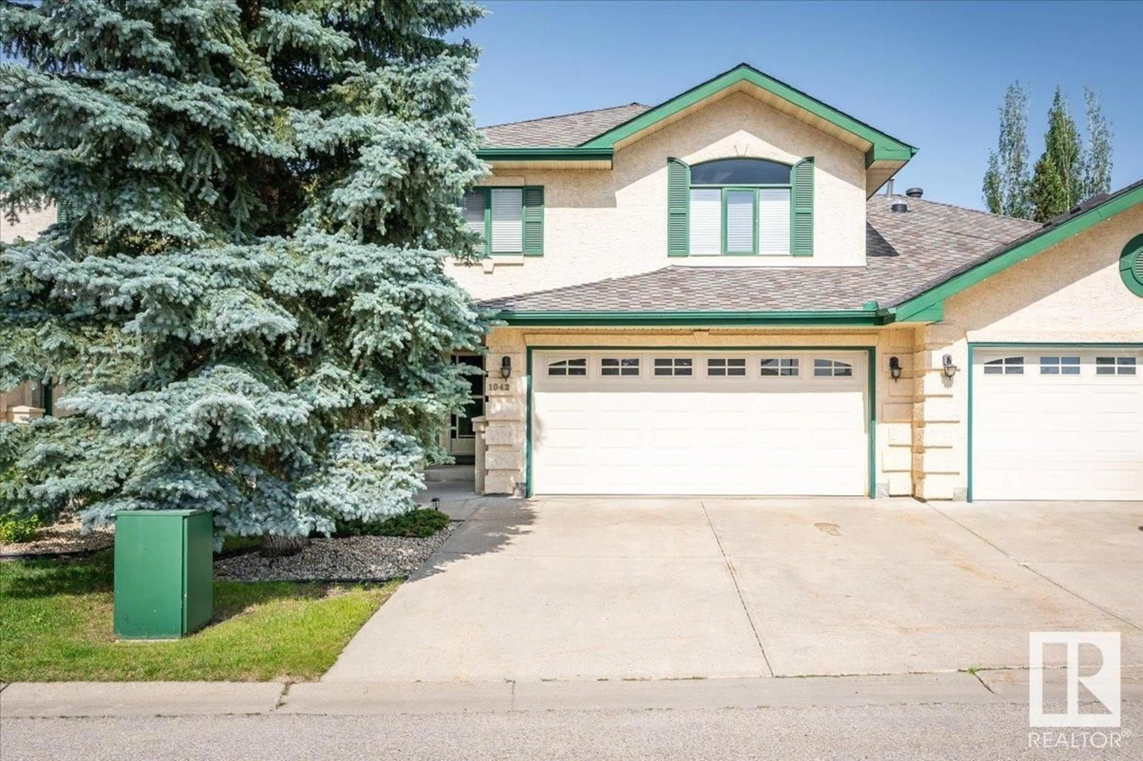 Home with vinyl exterior material, street for 1042 CARTER CREST RD, Edmonton Alberta T6R2K2