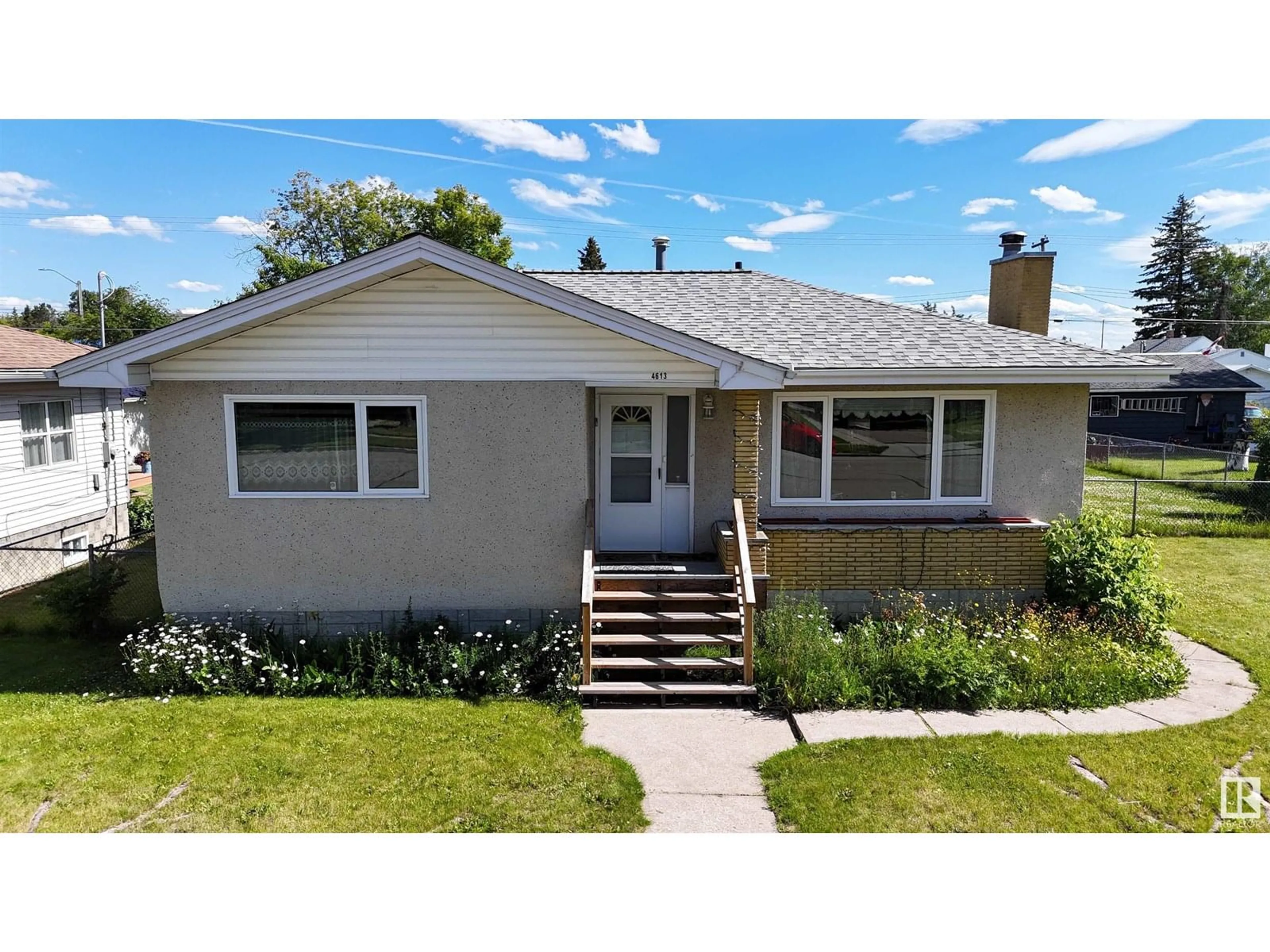 Home with vinyl exterior material, street for 4613 7 AVENUE, Edson Alberta T7E1C9