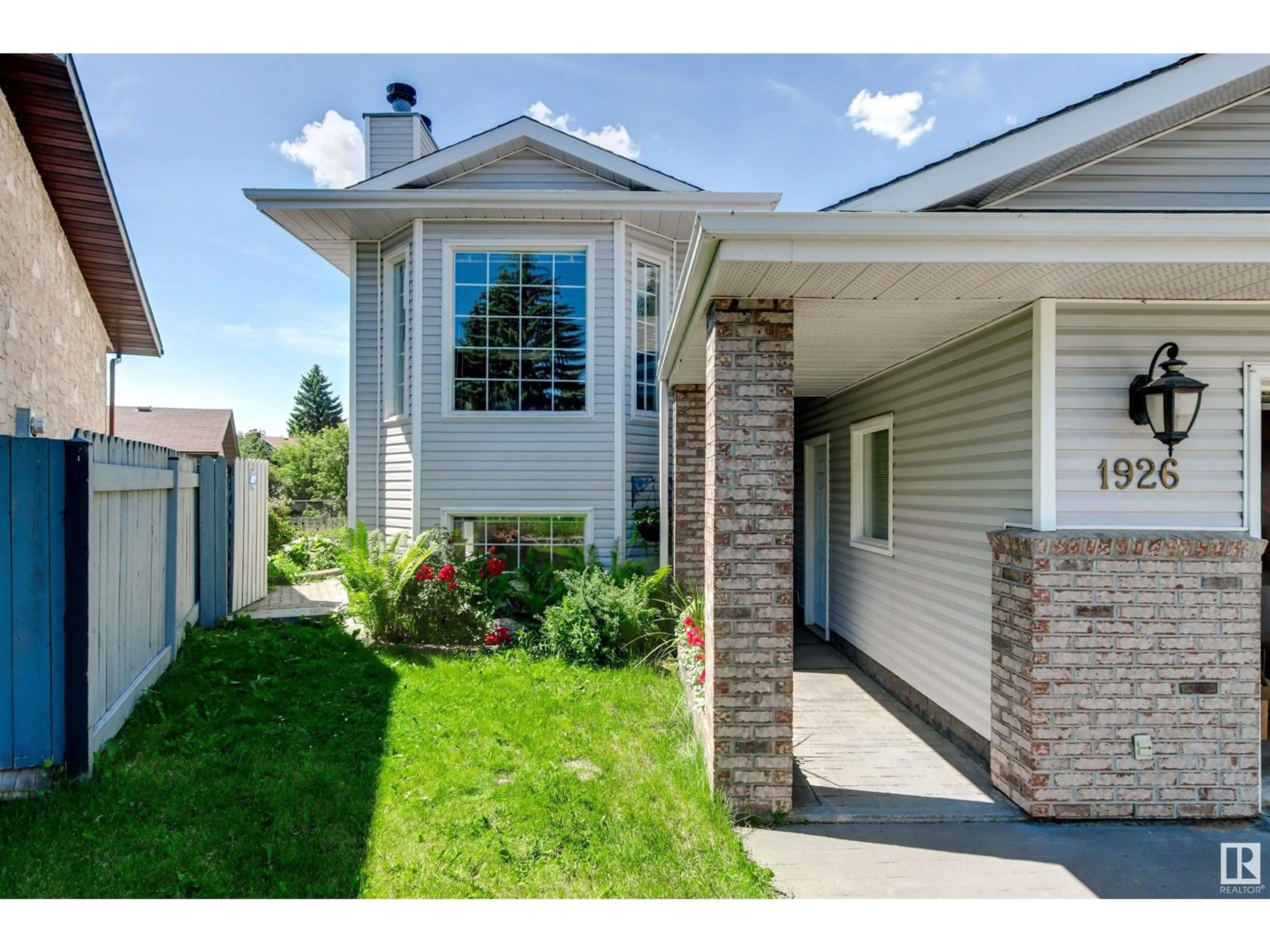 Home with vinyl exterior material, street for 1926 36 ST, Edmonton Alberta T6L3G5