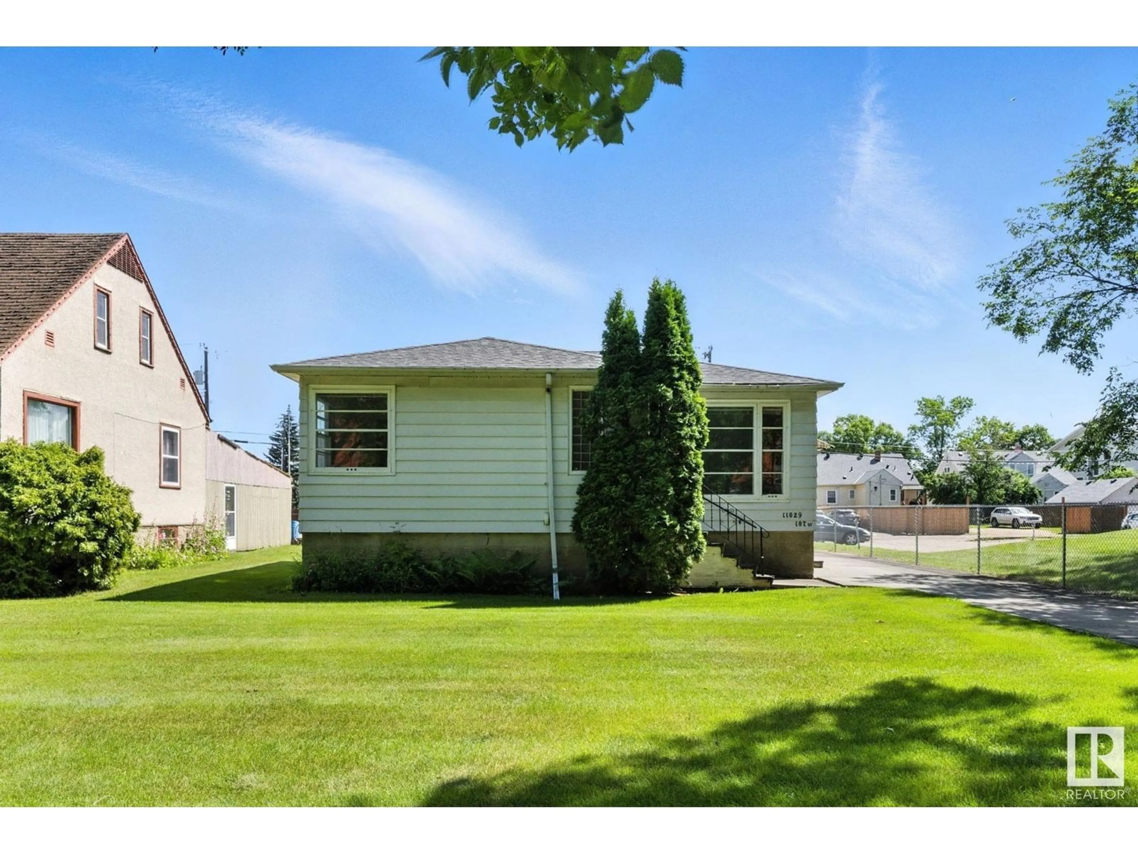 Home with vinyl exterior material, street for NW - 11029 107 ST, Edmonton Alberta T5H2Z6