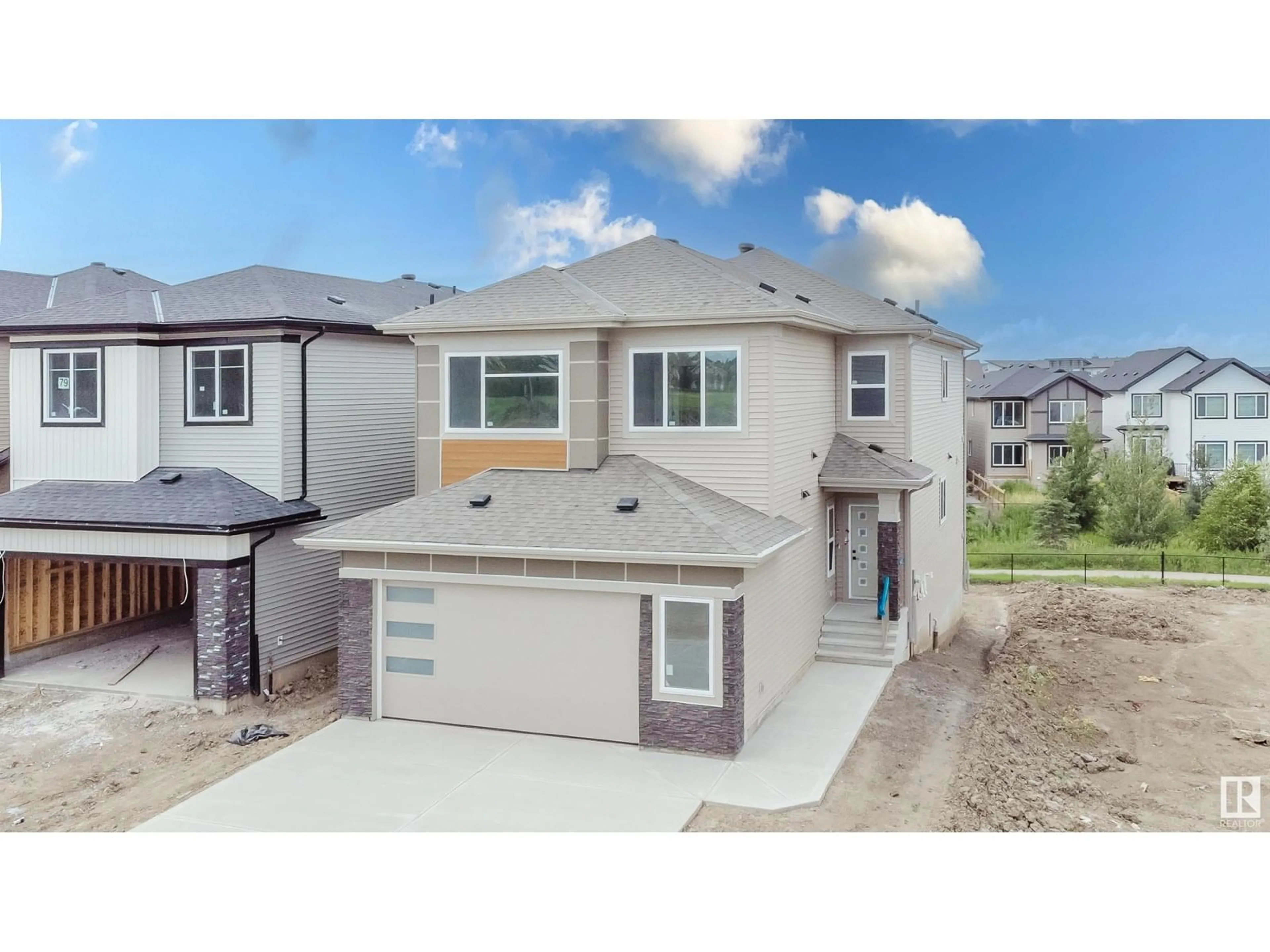 A pic from outside/outdoor area/front of a property/back of a property/a pic from drone, street for 77 MEADOWGROVE LN, Spruce Grove Alberta T7X0W2