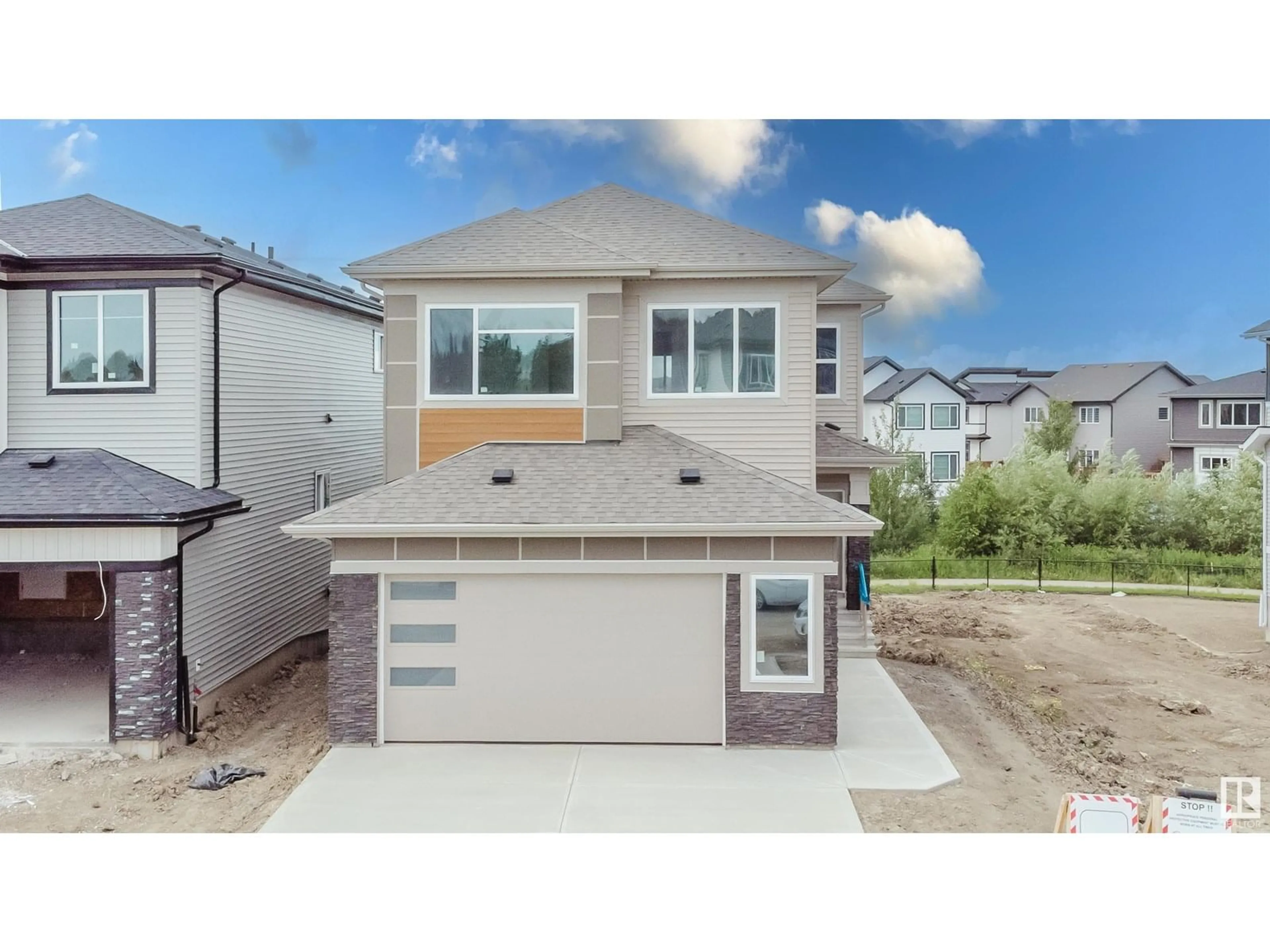 Home with vinyl exterior material, street for 77 MEADOWGROVE LN, Spruce Grove Alberta T7X0W2