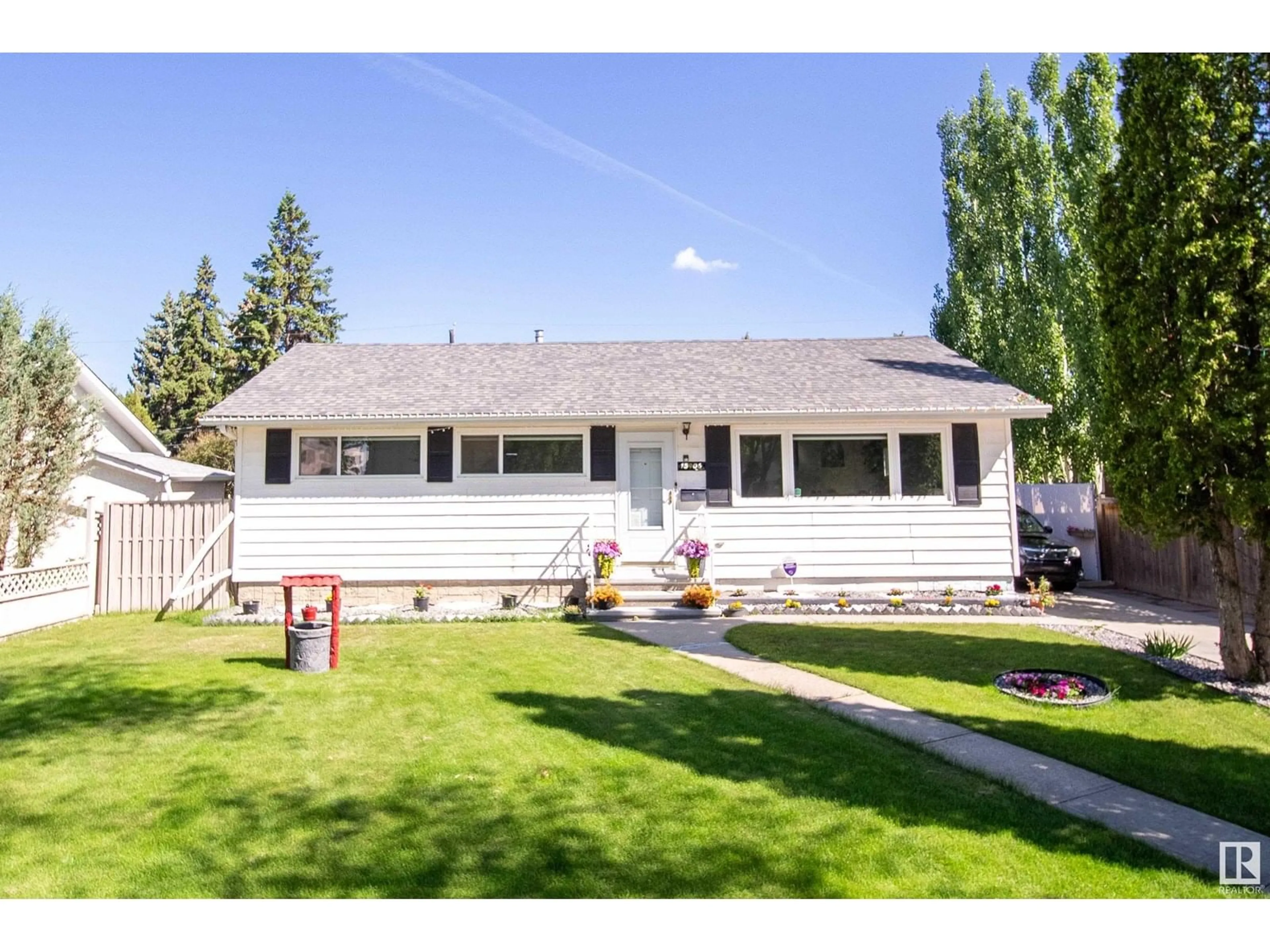 Home with vinyl exterior material, street for 15906 92 AV, Edmonton Alberta T5R5C6