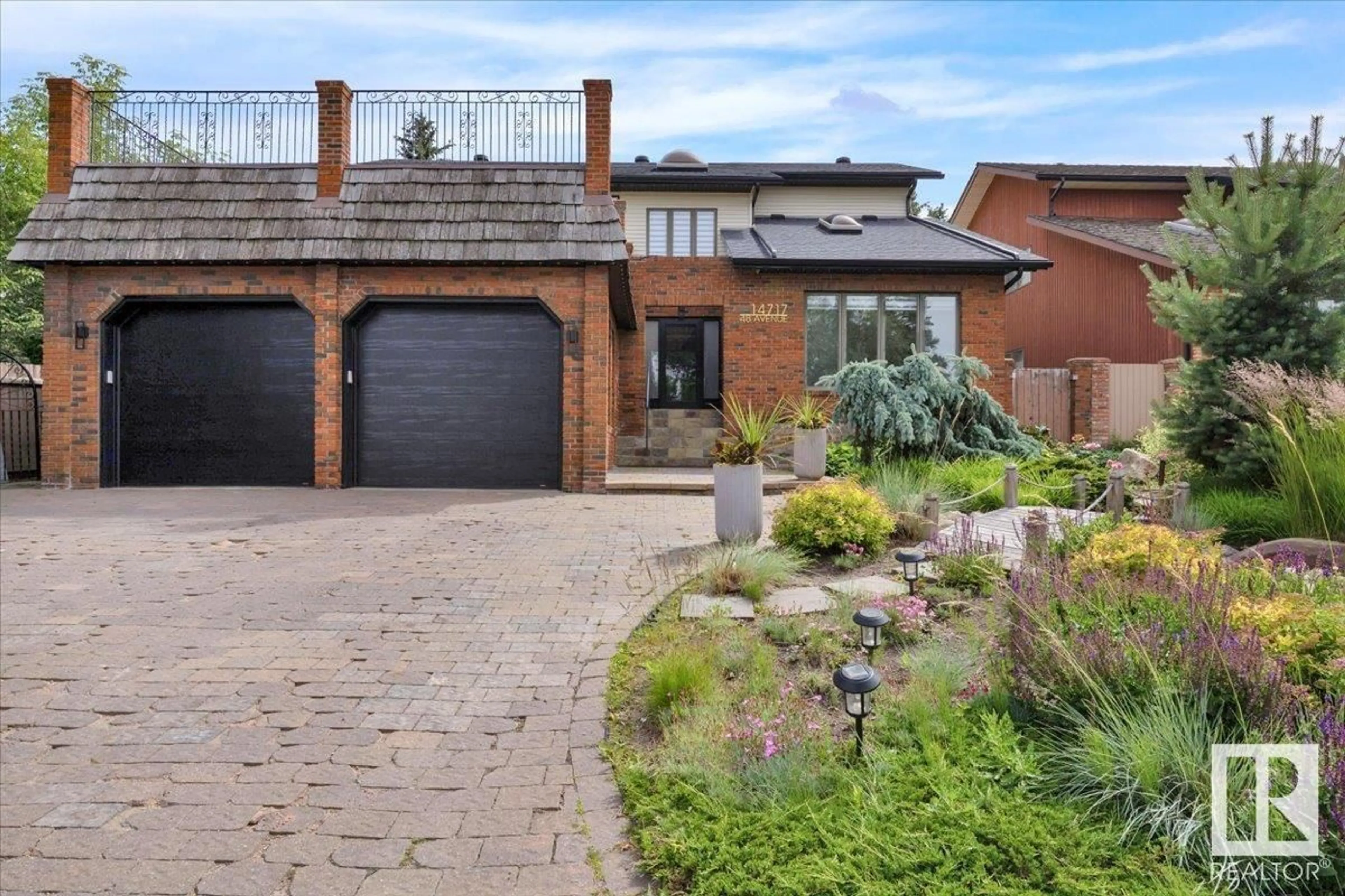 Home with brick exterior material, street for 14717 48 AV, Edmonton Alberta T6H5N1