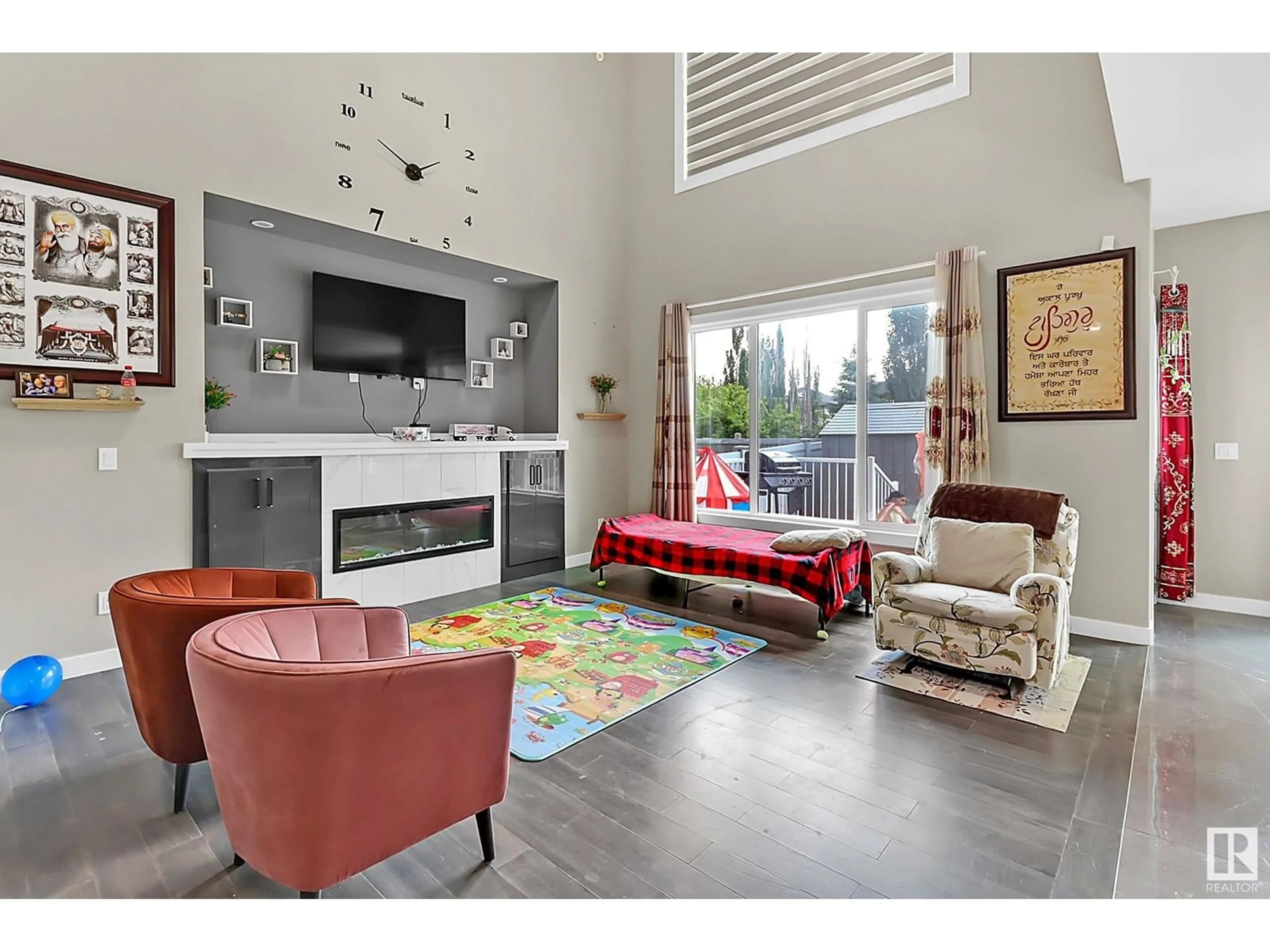 Living room with furniture, unknown for NW - 1419 150 AV, Edmonton Alberta T5Y3R5