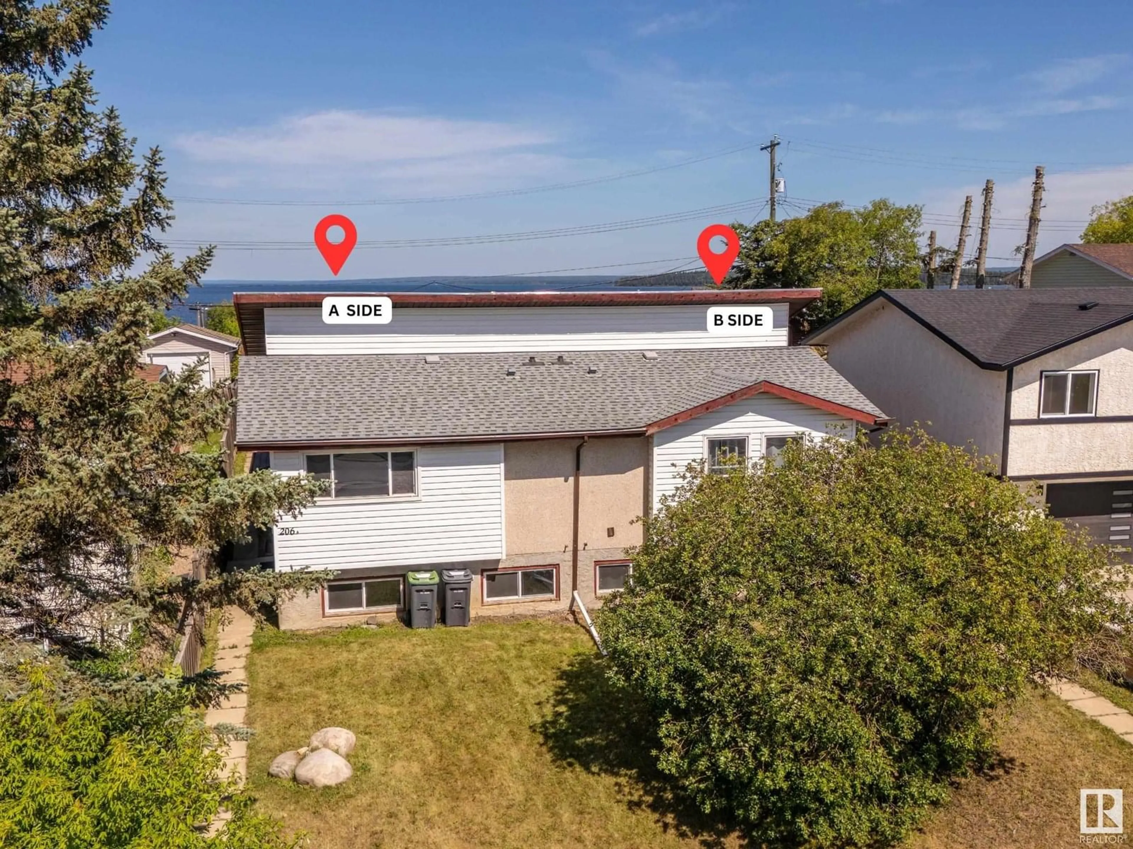 A pic from outside/outdoor area/front of a property/back of a property/a pic from drone, unknown for 206 10 ST, Cold Lake Alberta T9M1A5