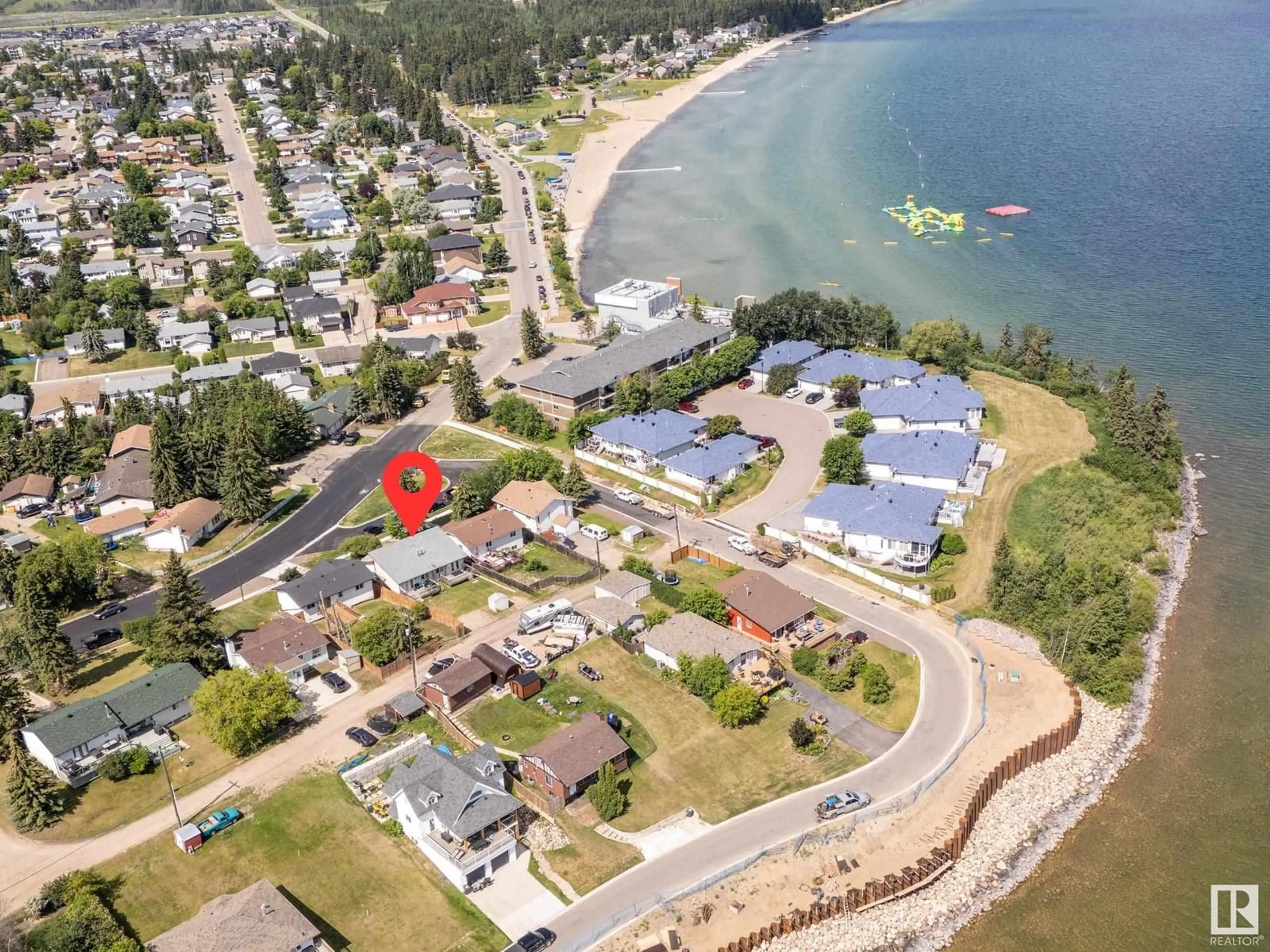 A pic from outside/outdoor area/front of a property/back of a property/a pic from drone, water/lake/river/ocean view for 206 10 ST, Cold Lake Alberta T9M1A5