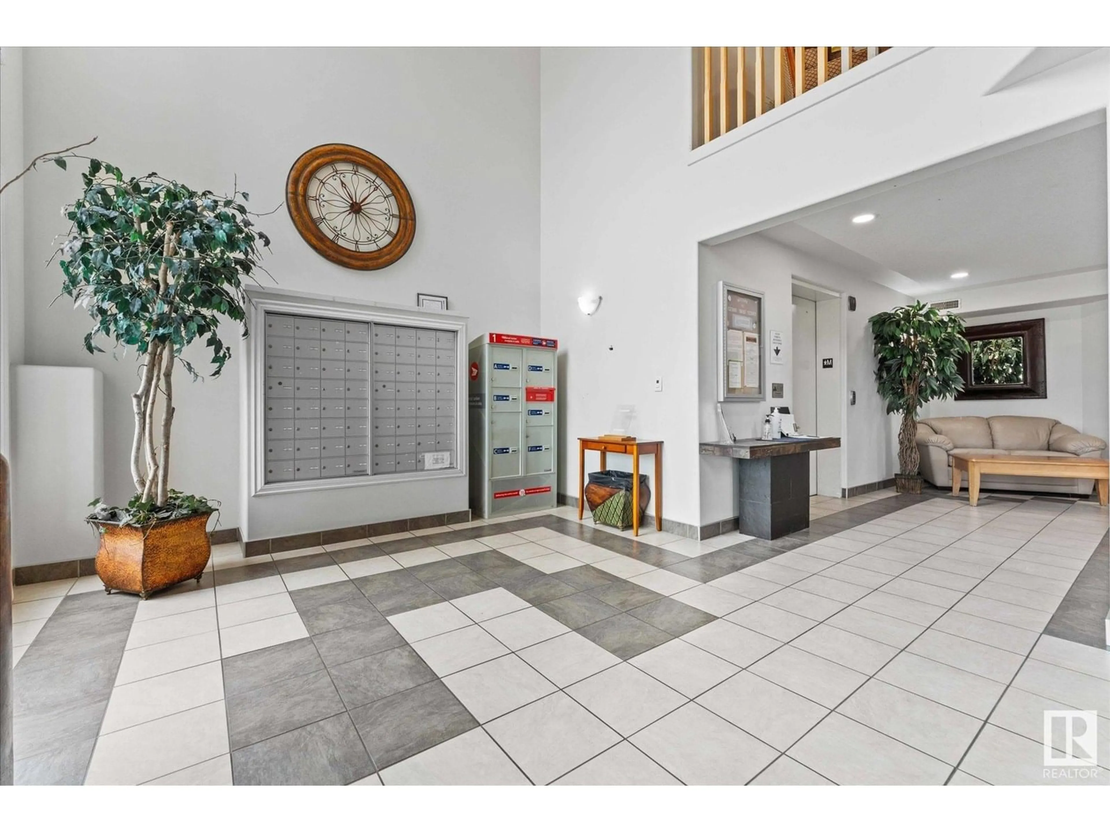 Indoor foyer for #303 - 7803 GOLF COURSE RD, Stony Plain Alberta T7X2Y6