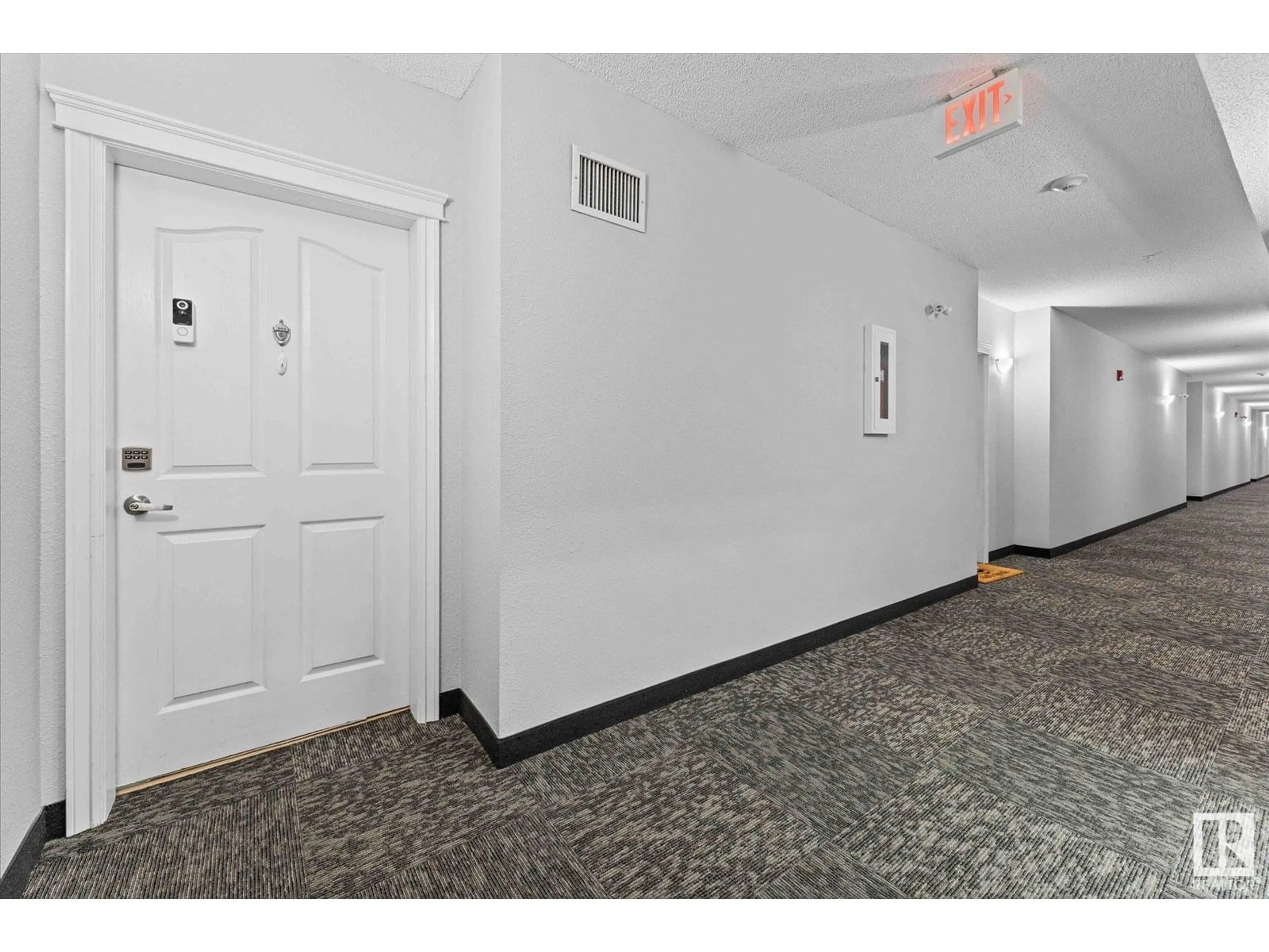 Indoor foyer for #303 - 7803 GOLF COURSE RD, Stony Plain Alberta T7X2Y6