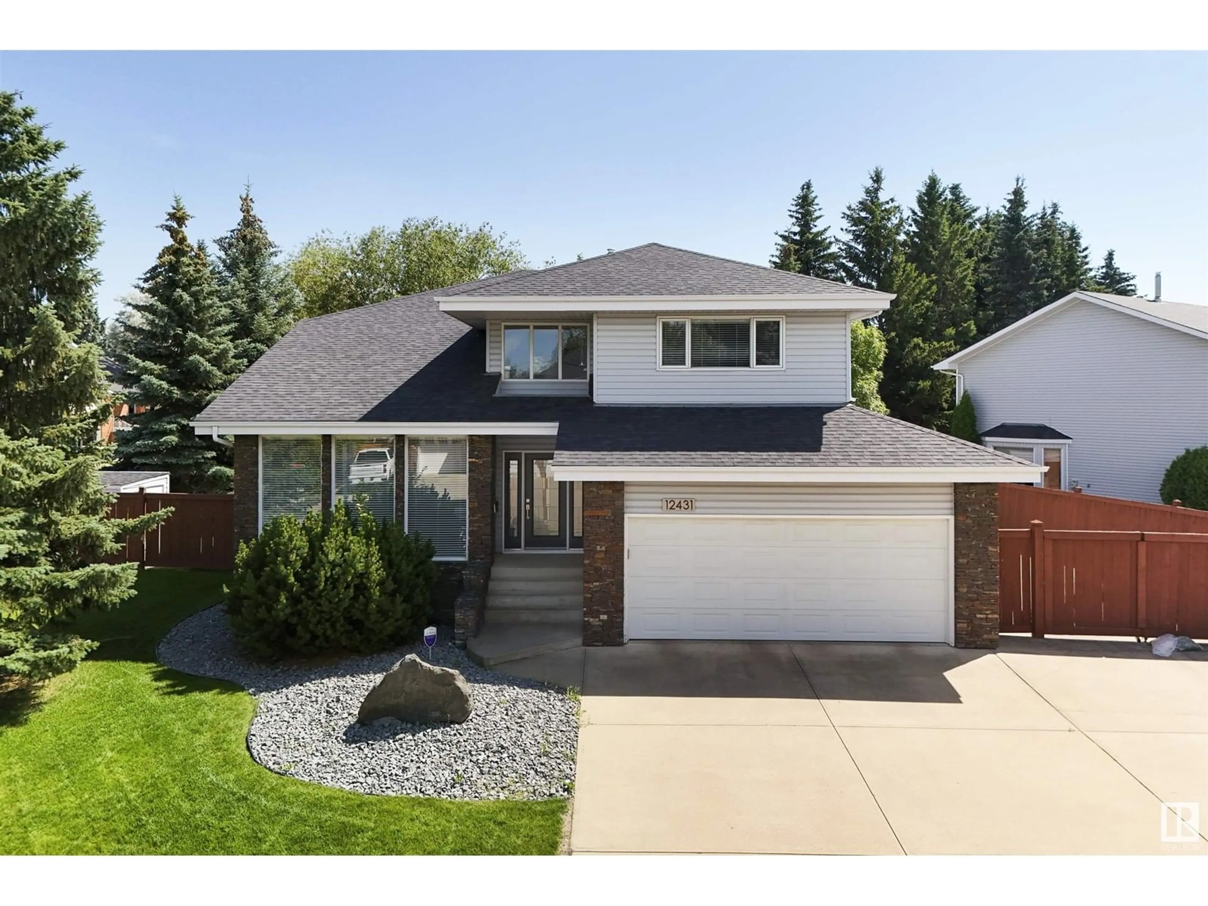 Home with vinyl exterior material, street for 12431 29A AV, Edmonton Alberta T6J6C8