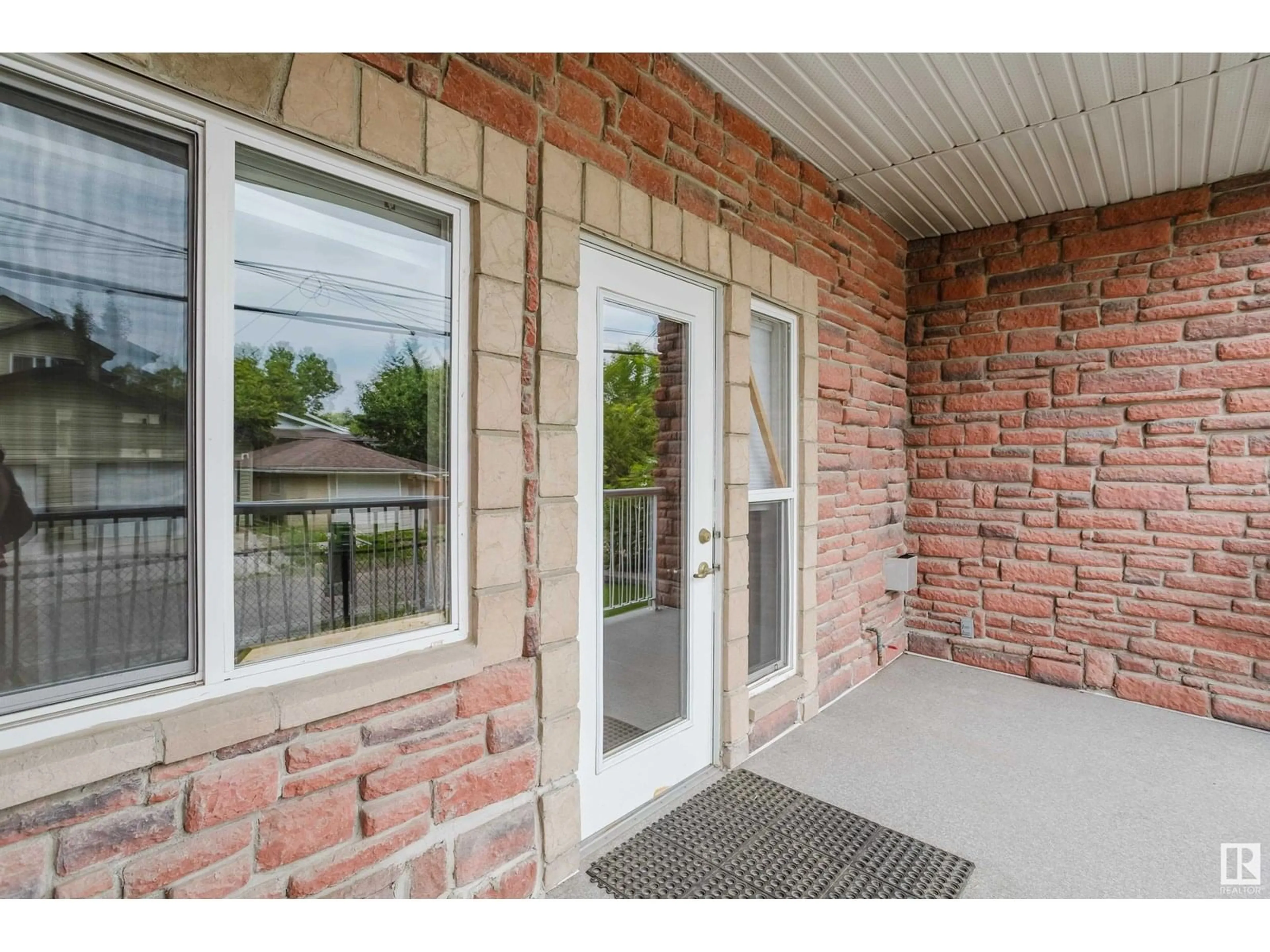 Home with brick exterior material, street for #130 - 8528 82 AV, Edmonton Alberta T6C0Y8