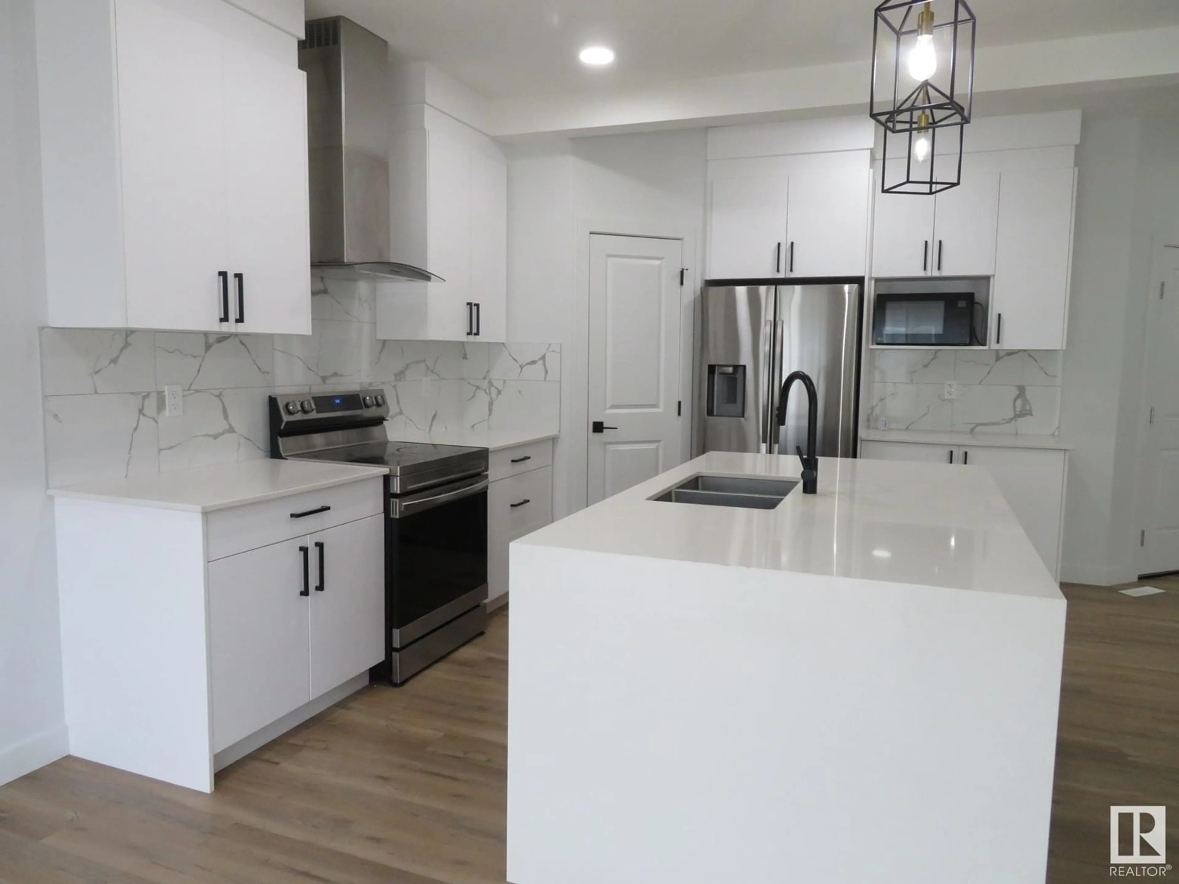 Open concept kitchen, ceramic/tile floor for 5747 KOOTOOK WY, Edmonton Alberta T6W4A5