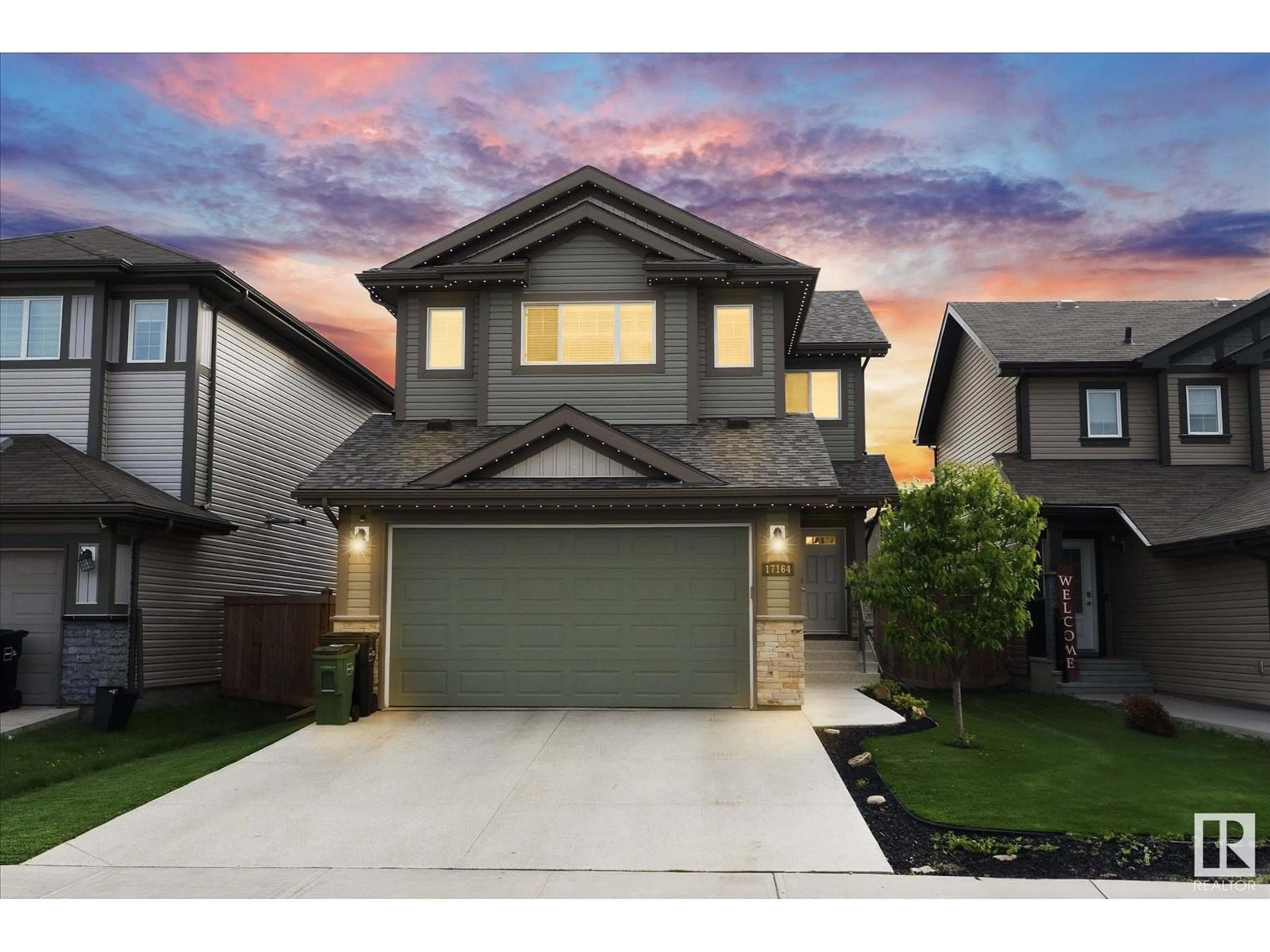 Home with vinyl exterior material, street for 17164 47 ST, Edmonton Alberta T5Y3P4