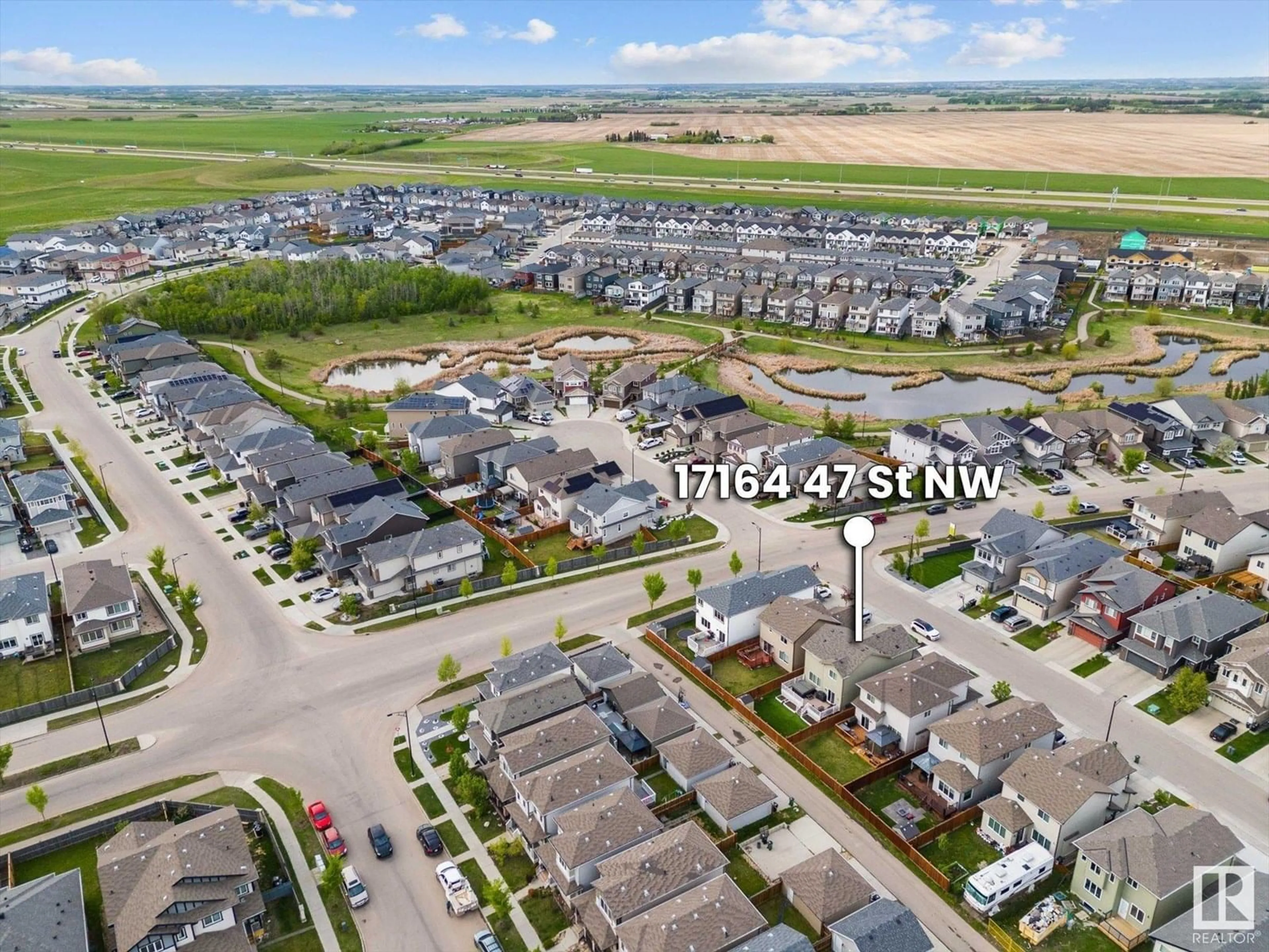 A pic from outside/outdoor area/front of a property/back of a property/a pic from drone, street for 17164 47 ST, Edmonton Alberta T5Y3P4