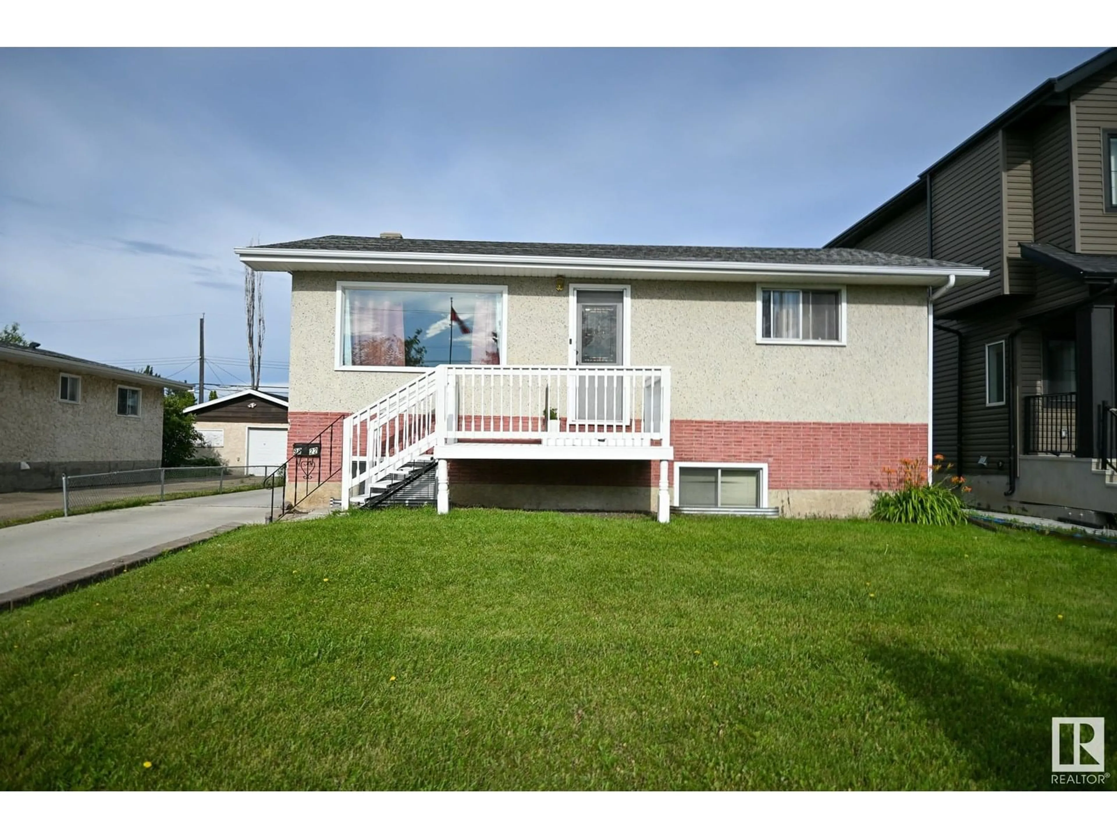 Home with vinyl exterior material, street for NW - 9822 158 ST, Edmonton Alberta T5P2X3