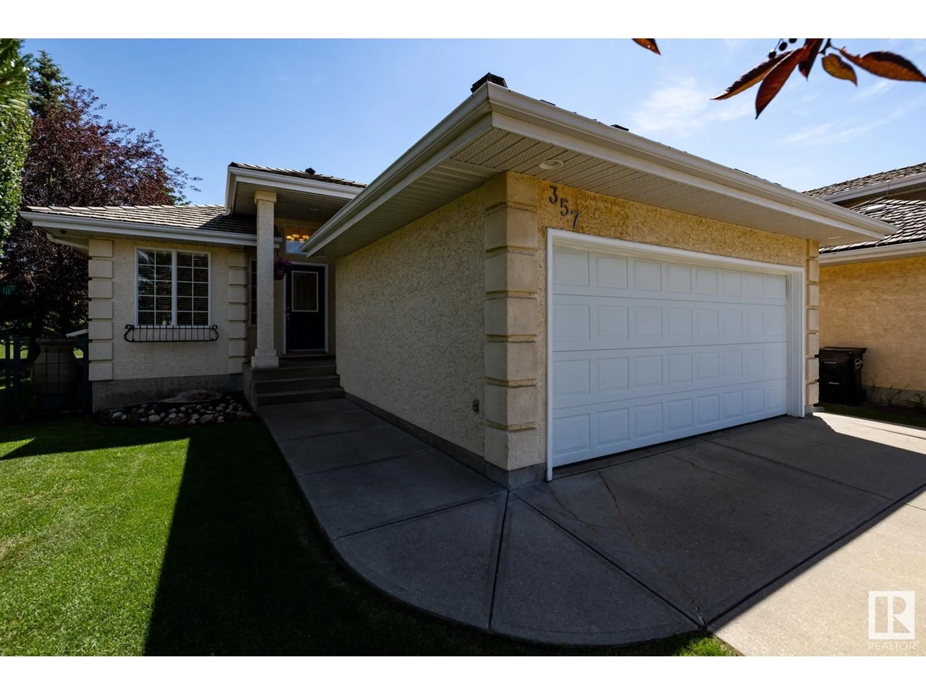 Home with vinyl exterior material, street for 357 BLACKBURN DR, Edmonton Alberta T6W1B8