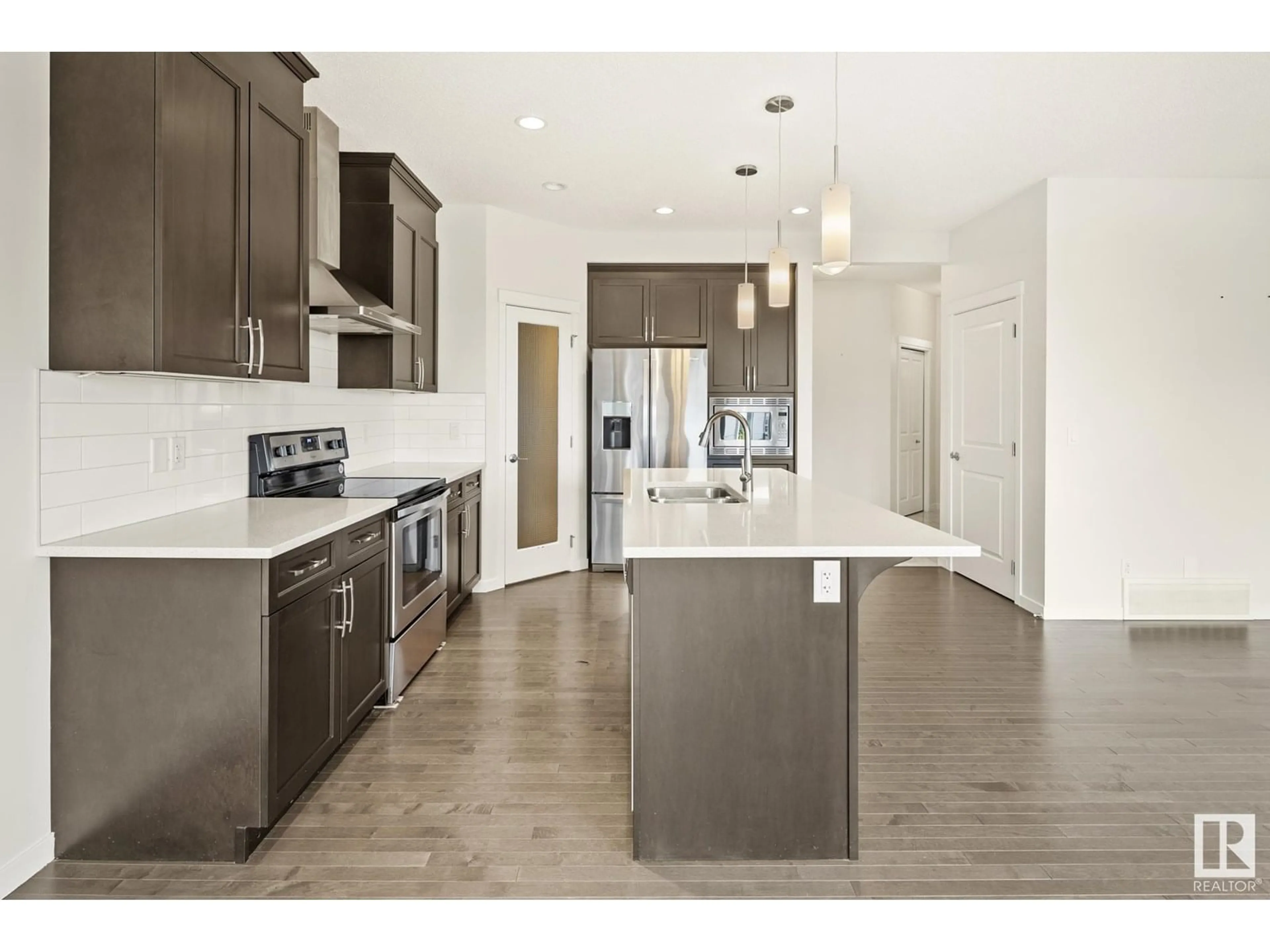 Open concept kitchen, unknown for 5404 22 AV, Edmonton Alberta T6X2H8