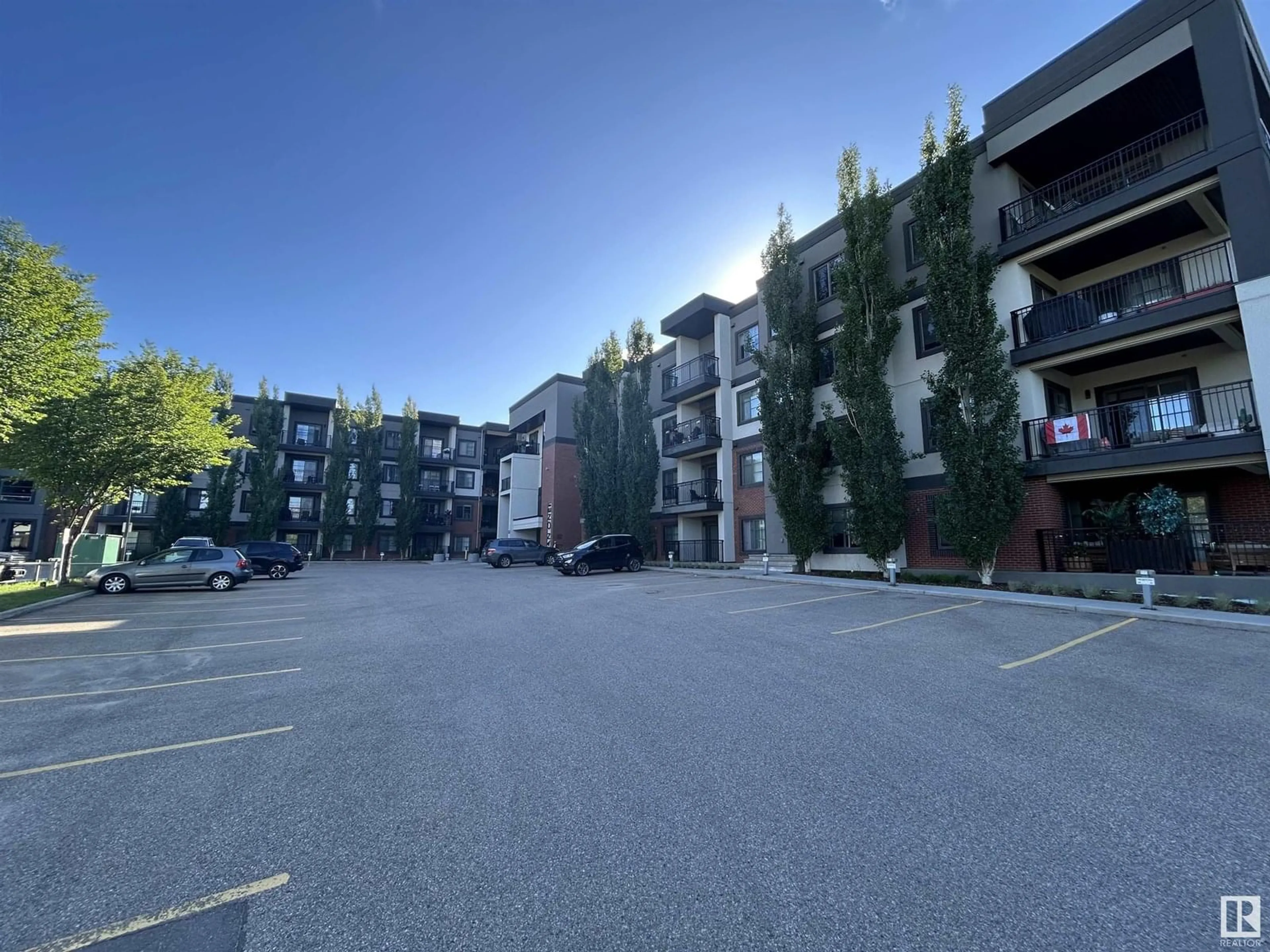 A pic from outside/outdoor area/front of a property/back of a property/a pic from drone, street for 317 - 1144 ADAMSON DR, Edmonton Alberta T6W2X7