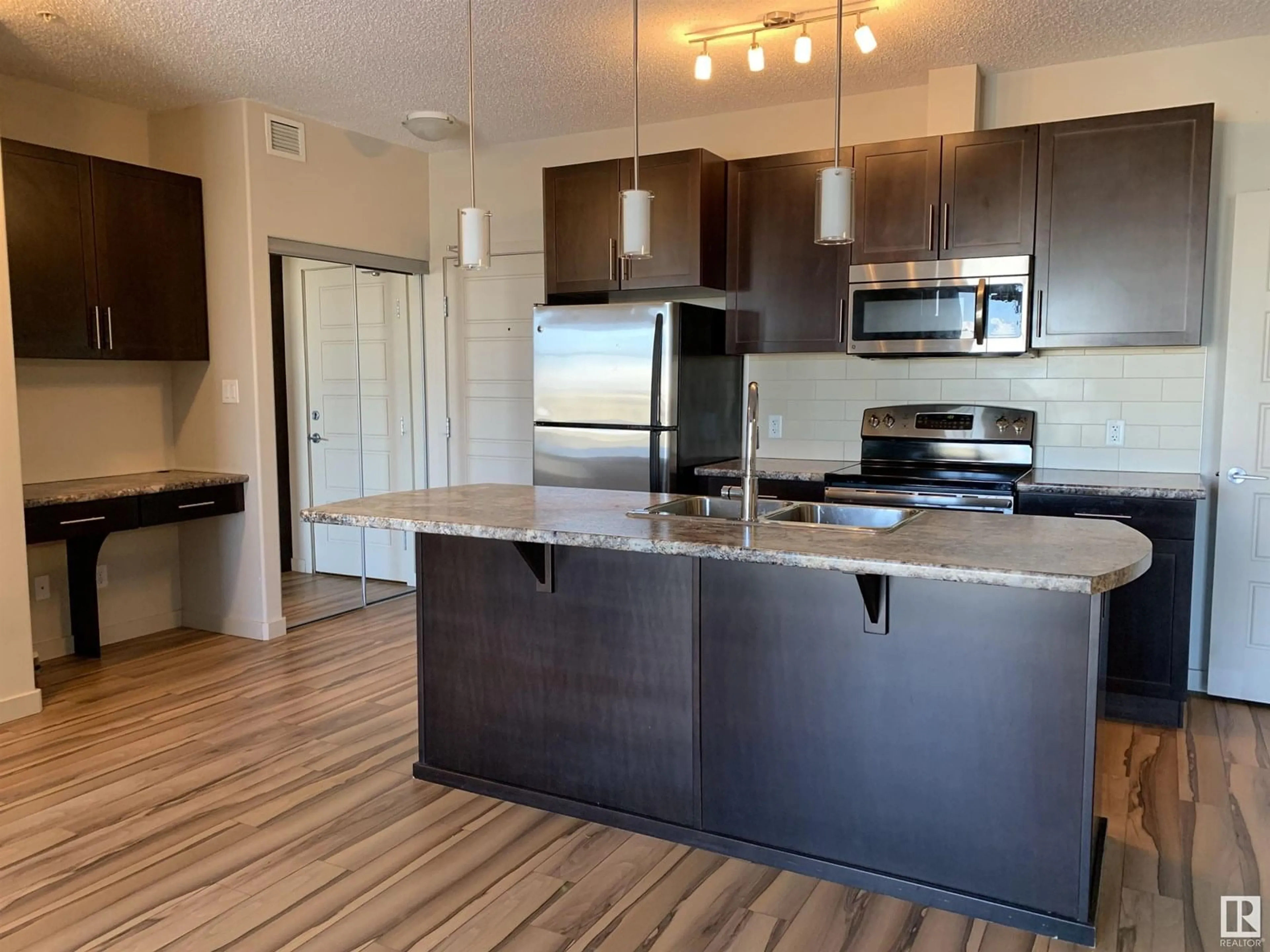 Open concept kitchen, unknown for 317 - 1144 ADAMSON DR, Edmonton Alberta T6W2X7